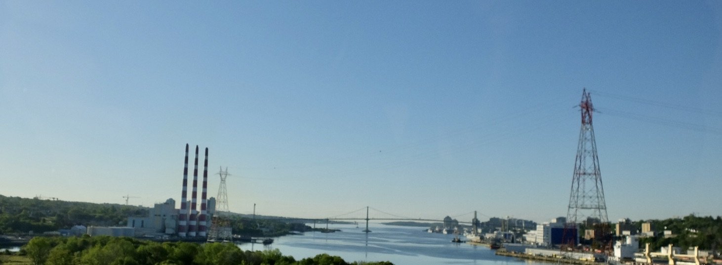  MacKay Bridge over Halifax Harbor, Nova Scotia.  We saw lots of these huge electrical power towers throughout our stay in Canada.  They were carrying hydro-electic generated power. Taxi ride on the way to Prince Edward Island (PEI). 