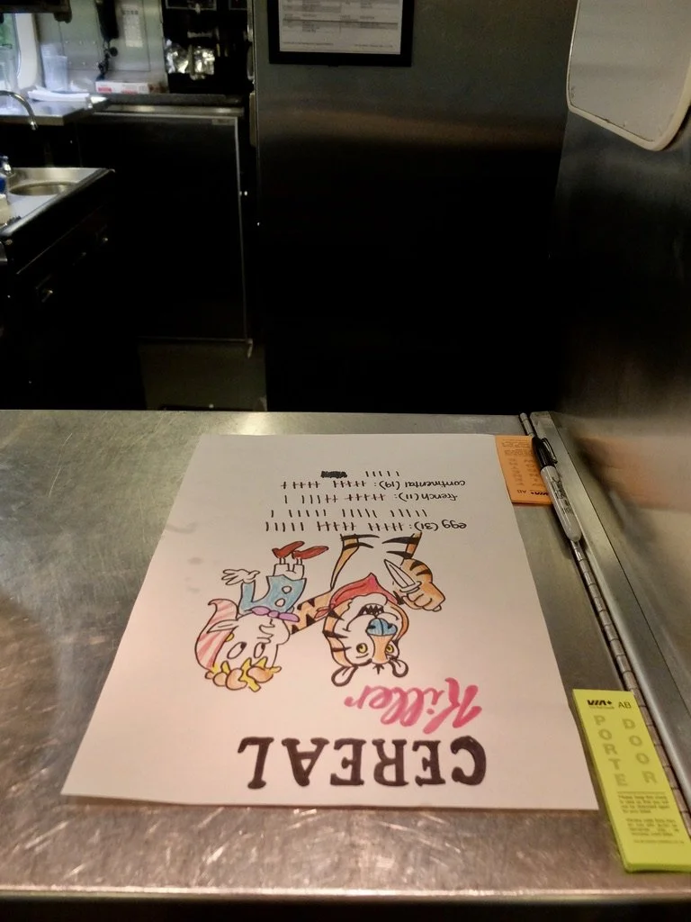  “CEREAL”  Cute.  I guess this is how the kitchen staff keeps track of breakfast meals served.  Turn it upside down.    VIA sleeper train to Montréal. 