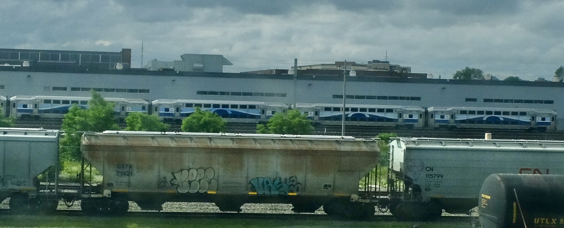  Approaching Union Station, Montréal on the VIA sleeper train from Moncton. Commuter train with neat graphics. 
