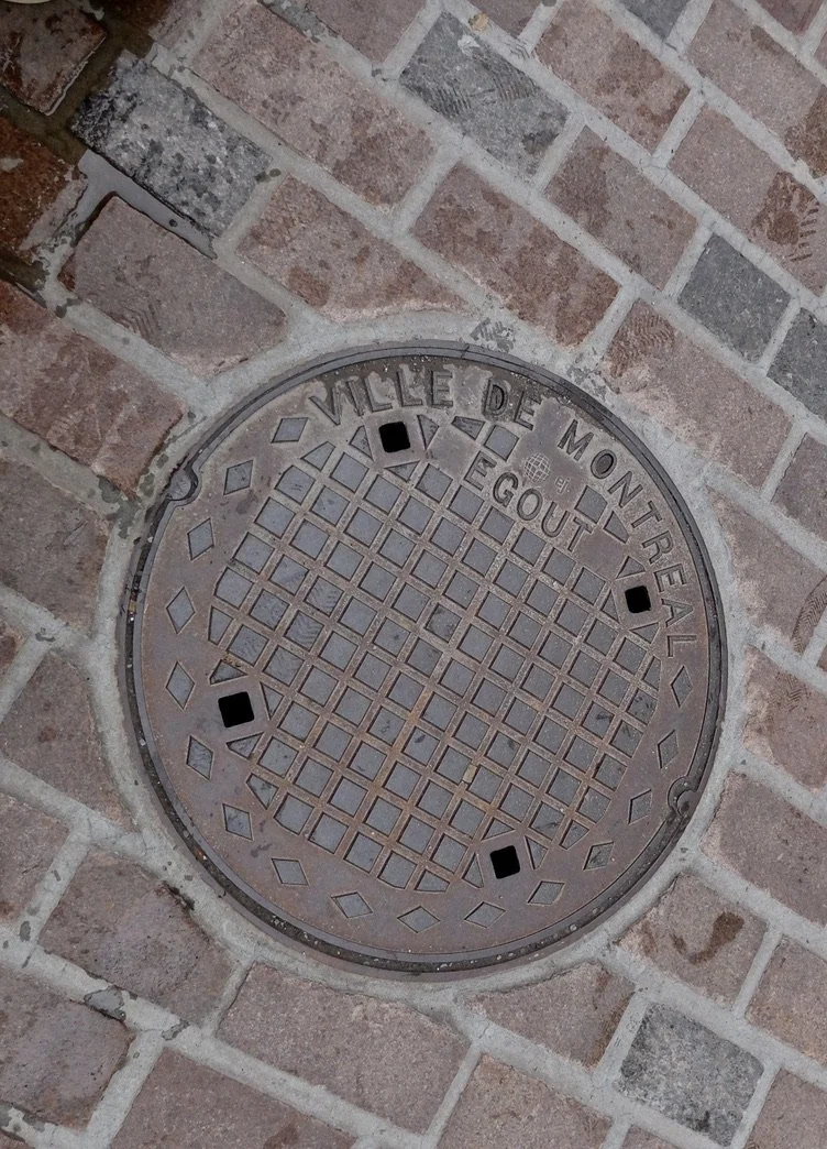  EGOUT=SEWER.  Old Port neigborhood of Old Montréal. 