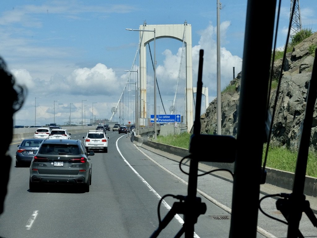 Entering Québec City. The ca. 1070 Pierre Laporte Bridge ".. is the longest main span suspension bridge in Canada.  It crosses the Saint Lawrence River…Named in  ...honour of Quebec Vice-Premier Pierre Laporte, who was kidnapped and murdered during 