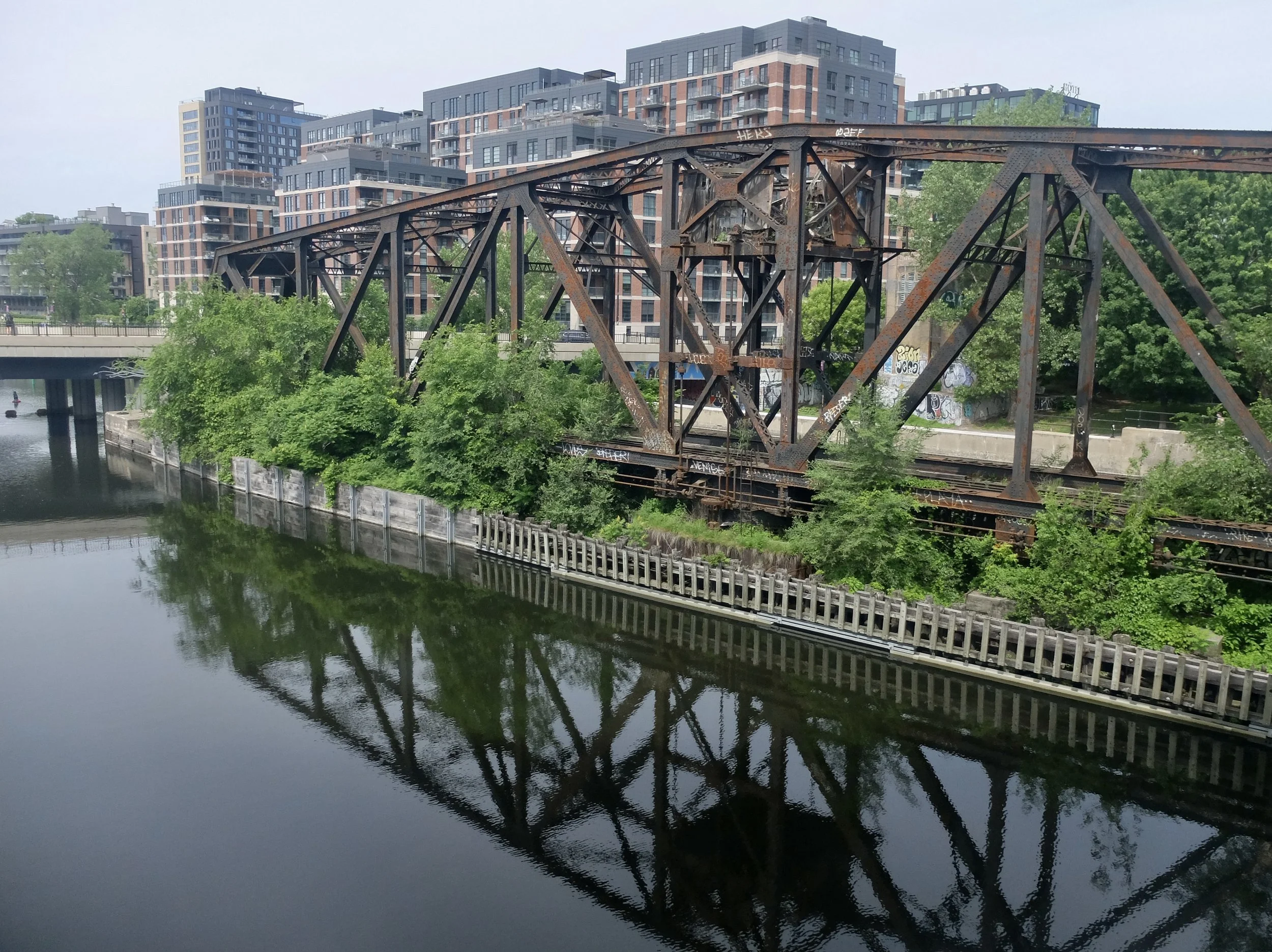  The CNR Wellington Bridge ca. 1912 over the Lachine Canal was abandoned in 1970.  Seen as leaving Montréal on the train to Toronto. 