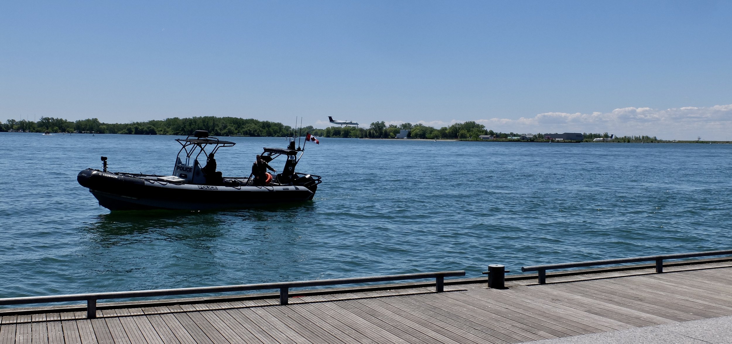  Plane on approach to Billy Bishop Airport.  Cap’n Will said that these Toronto Marin Police have the fastest boats on the Lake &amp; that these folks are enforcers.   