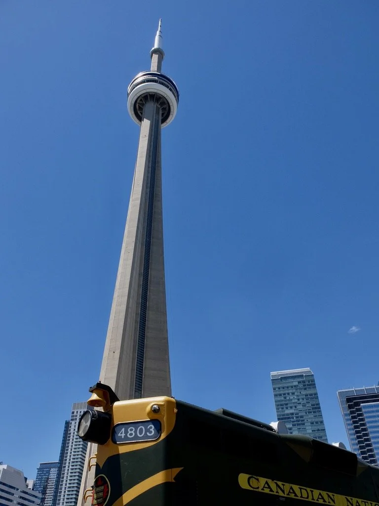  The 1,815.3&nbsp;ft communications and observation CN  Towe r as seen from the Toronto Railway Museum.  Canadian National Tower was the tallest in the world from 1975 to 2007. “…built on the former  Railway Lands . Its name ‘CN’ refers to  Canadian 