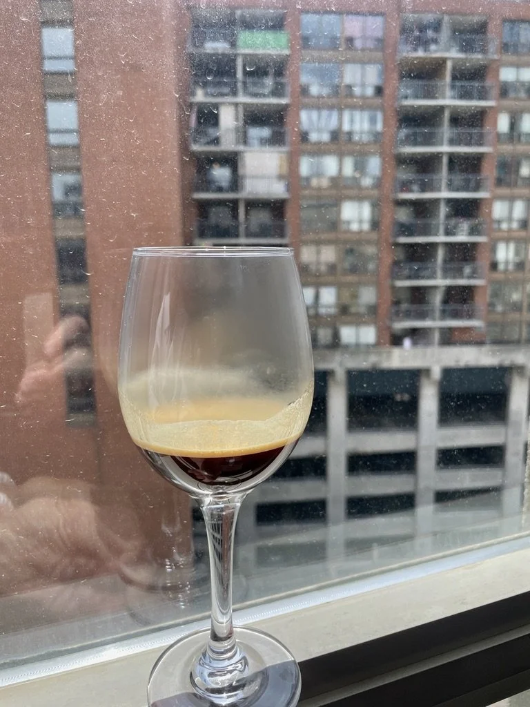  We returned to the Novotel Toronto Centre.  They were kind enough to grant us a late check out the next day when our train departure was so delayed.   The espresso machine in our room had only paper cups.  I improvised. 