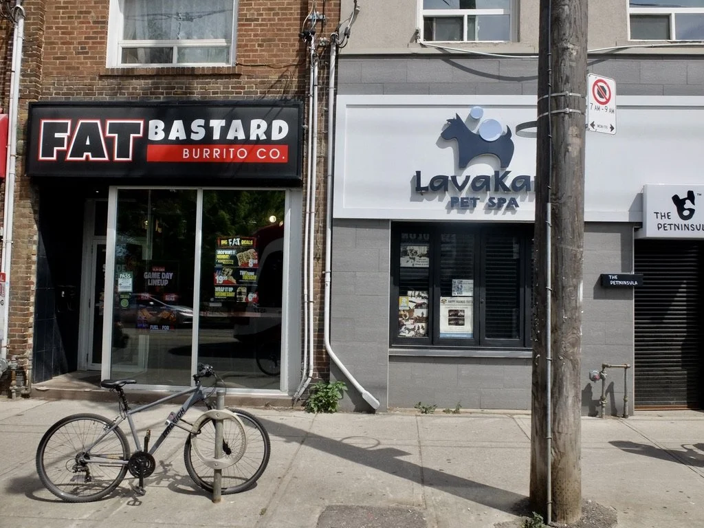  "FAT Bastard Burrito Co.”  The 501 Queen Streetcar route.  