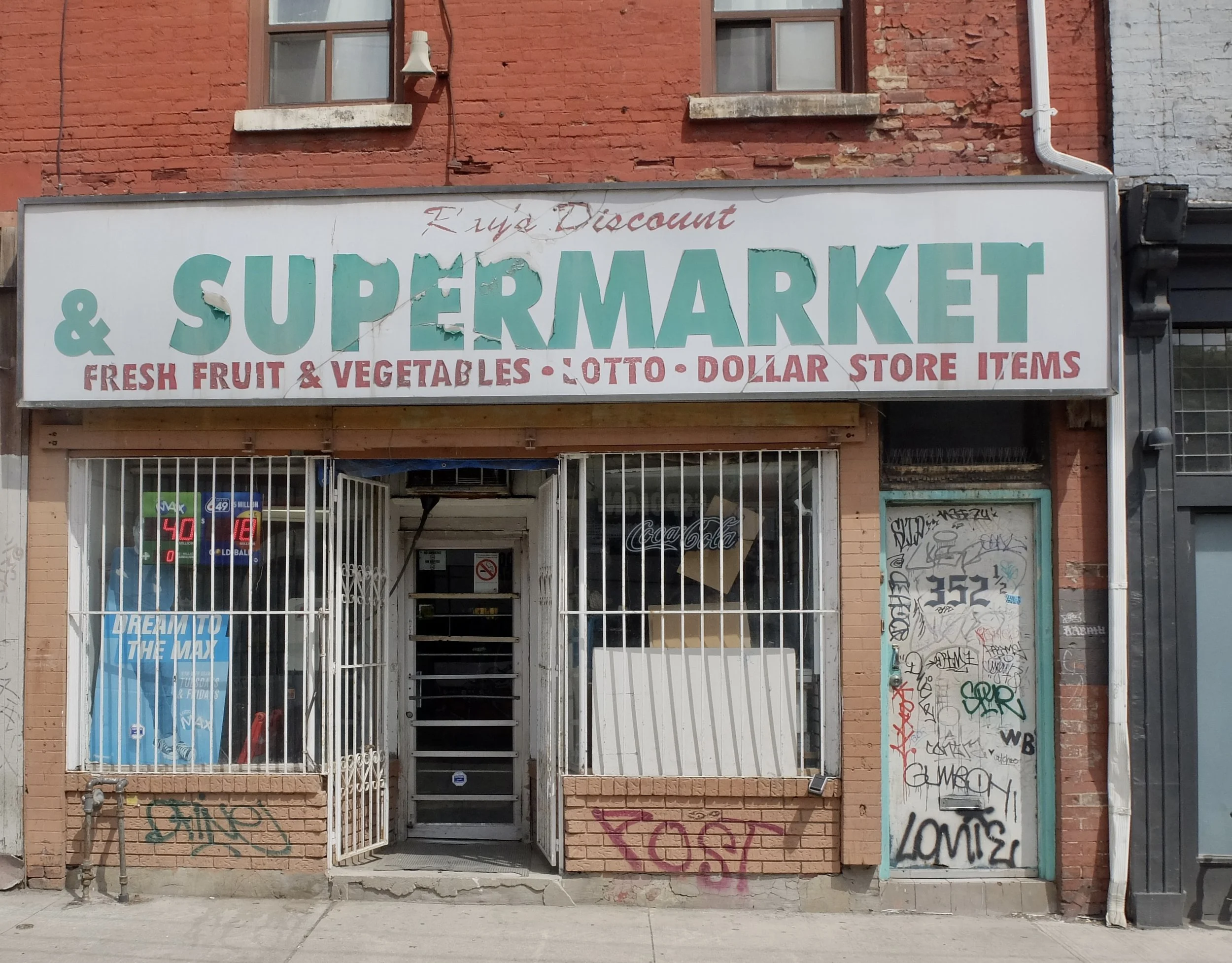  "Ray's Discount &amp; SUPERMARKET”  Some neighborhoods are not as good as others…  The 501 Queen Streetcar route. 