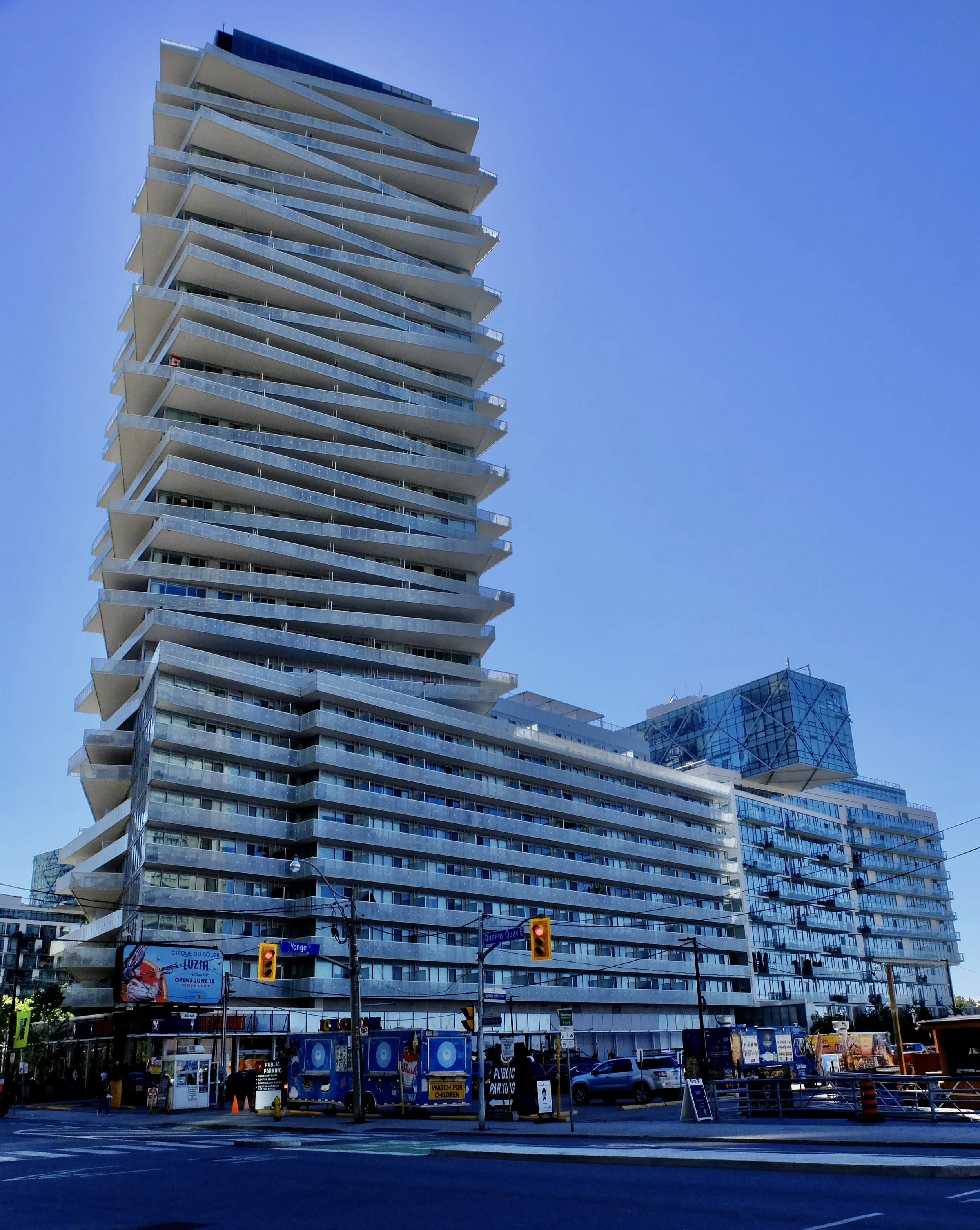  Unusual architecture like what we saw in Melbourne, Australia in 2014.  The architects seem to be having a field day.  The 2021 Tower at Pier 27 15 Queens Quay E, Toronto, ON M9N 2H3 