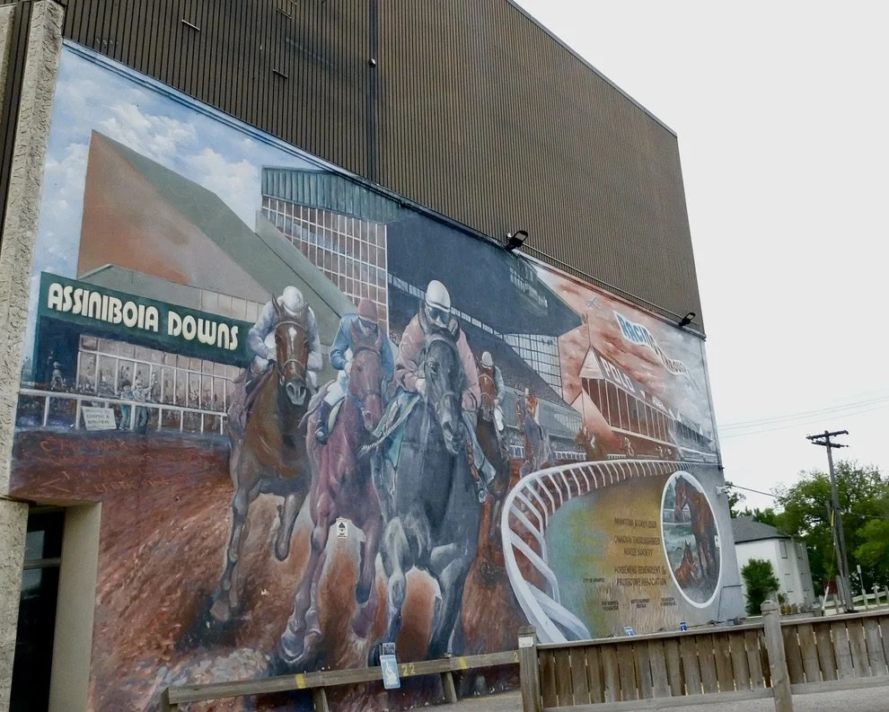  From the taxi on the way to  Winnipeg Richardson International Airport.   "Assiniboia Downs is open year round offering exciting live thoroughbred racing and daily televised racing, 140 VLTs in our licensed gaming lounge &amp; delicious dining….Winn