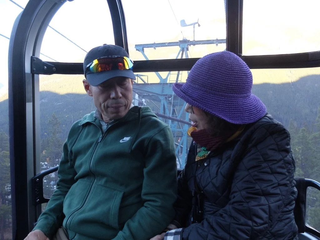  We a shared gondola down from Sulfur Mountain with a couple from South Korea.  Their English was negligible &amp; our Korean non-existent. 