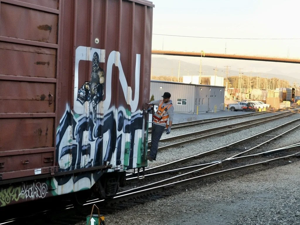  Train yard well before the Vancouver, B.C. Pacific Central Train Station.  We were stopped but his freight car was moving.  