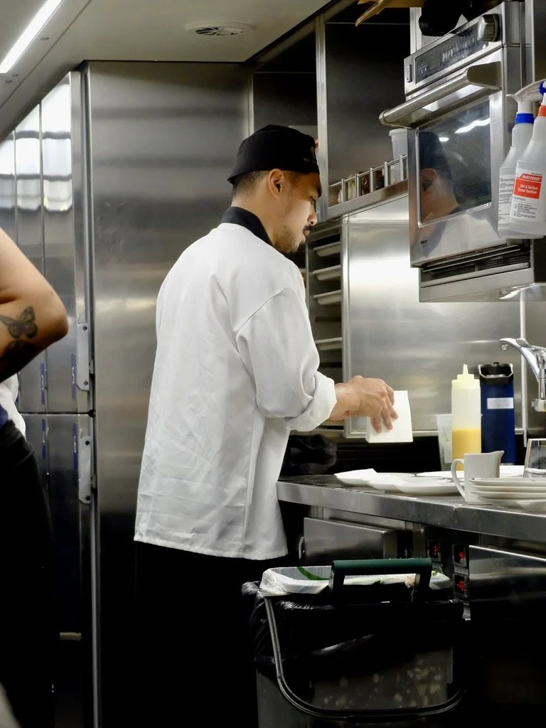  They kitchen workers prepared &amp; served breakfast &amp; lunch for two separate seatings. 