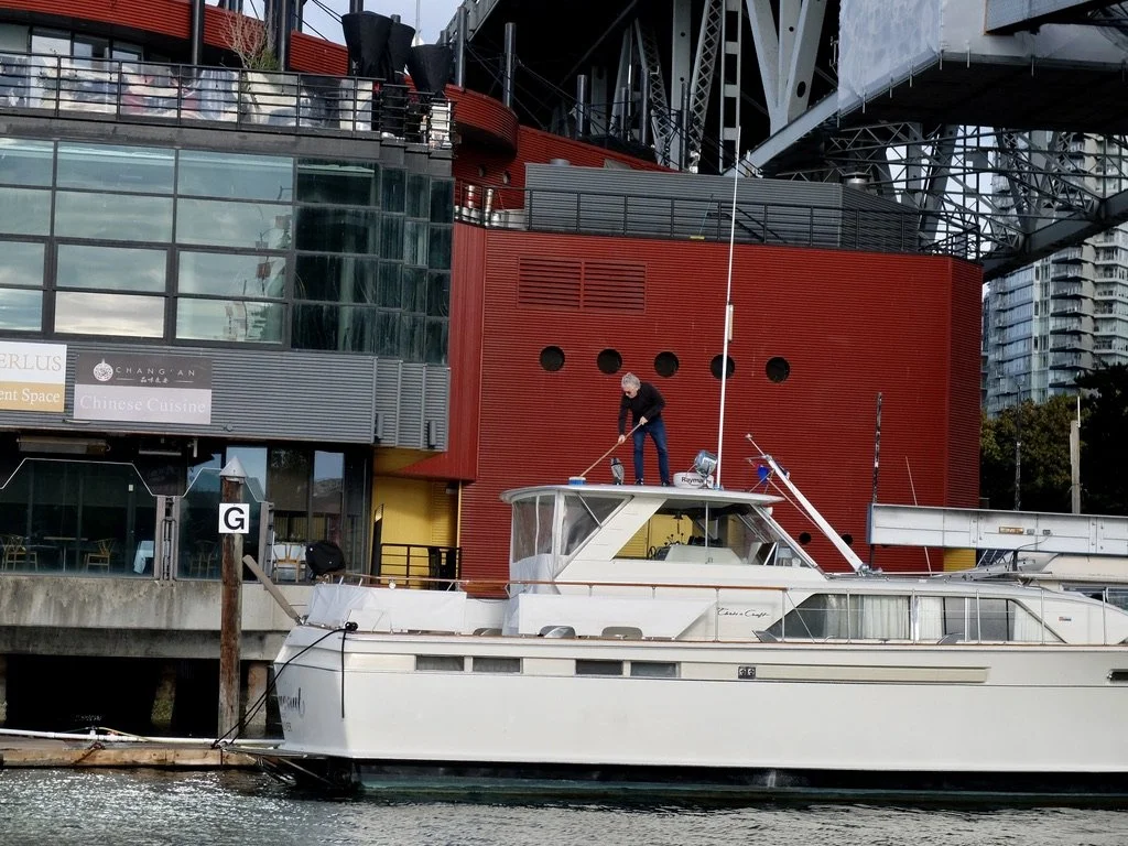  Swabbing the deck.  Keeping that boat ship-shape at The False Creek Yacht Club, “The Star of False Creek,”  Vancouver, B.C. 
