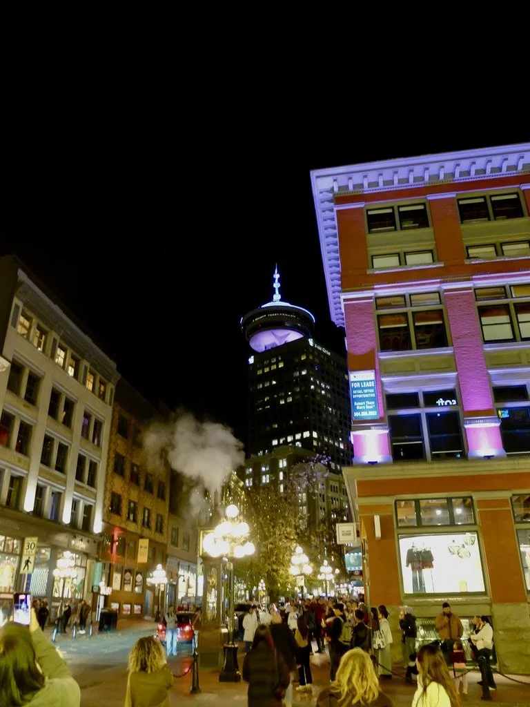  Tourists waiting around the Gastown Vancouver’s steam clock.  One of the few remaining steam clocks “Incorporating a steam engine and electric motors, the clock displays the time on four faces and announces the quarter hours with a whistle chime tha