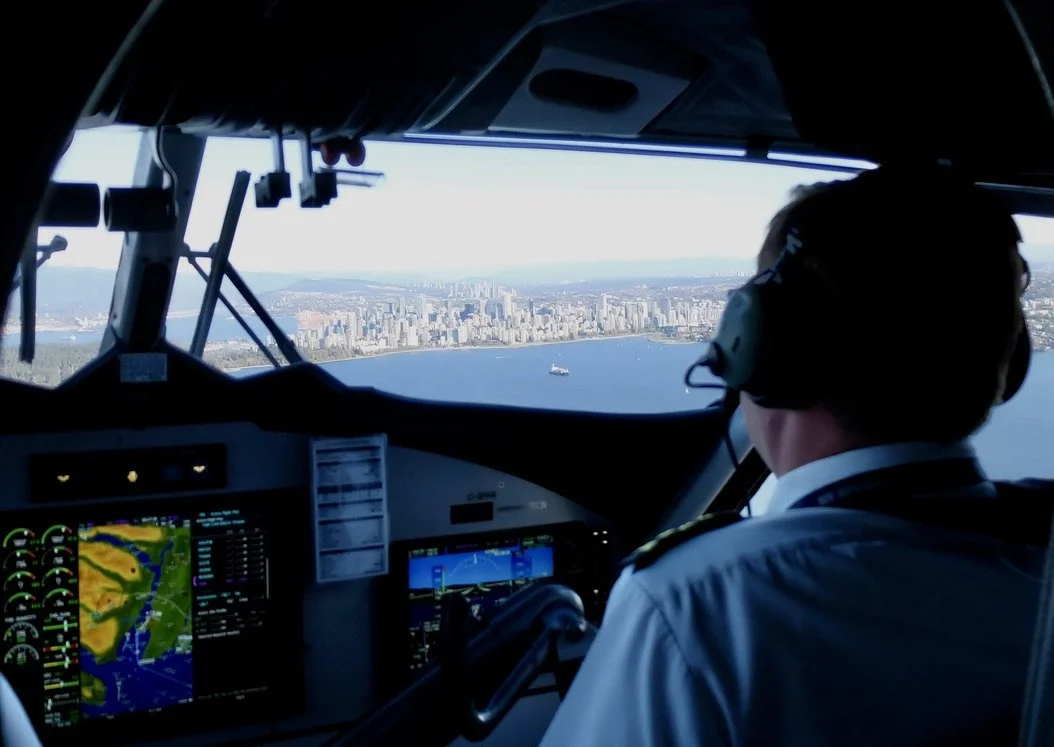  Harbour Air float plane pilots piloting our return to Vancouver.  