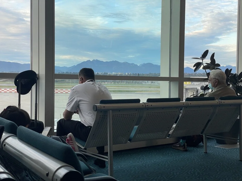 Our pilot waiting patiently, as we were, for our long delayed Air Canada flight to appear. 