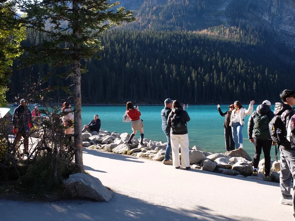  Busloads of tourists descended on Lake Louise each day to take a look &amp; take photos.   
