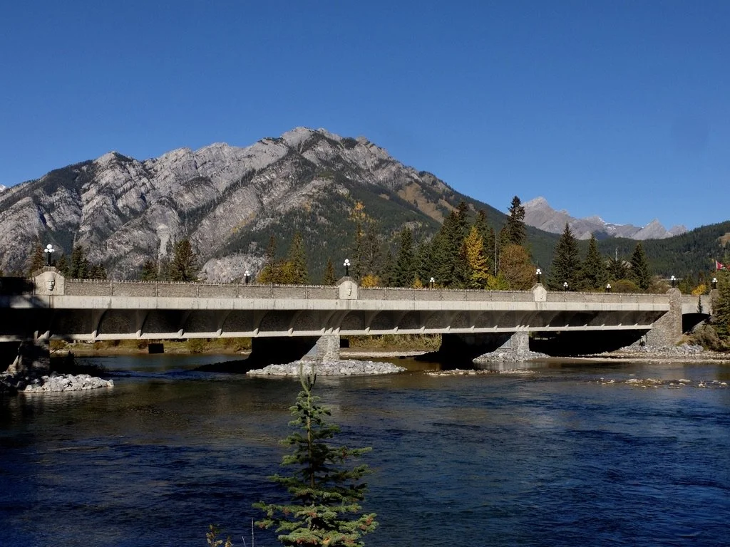  Banff’s Bow River Bridge. "The river’s name, Bow, originated from the reeds growing along its banks, which the First Nations used to make bows." 