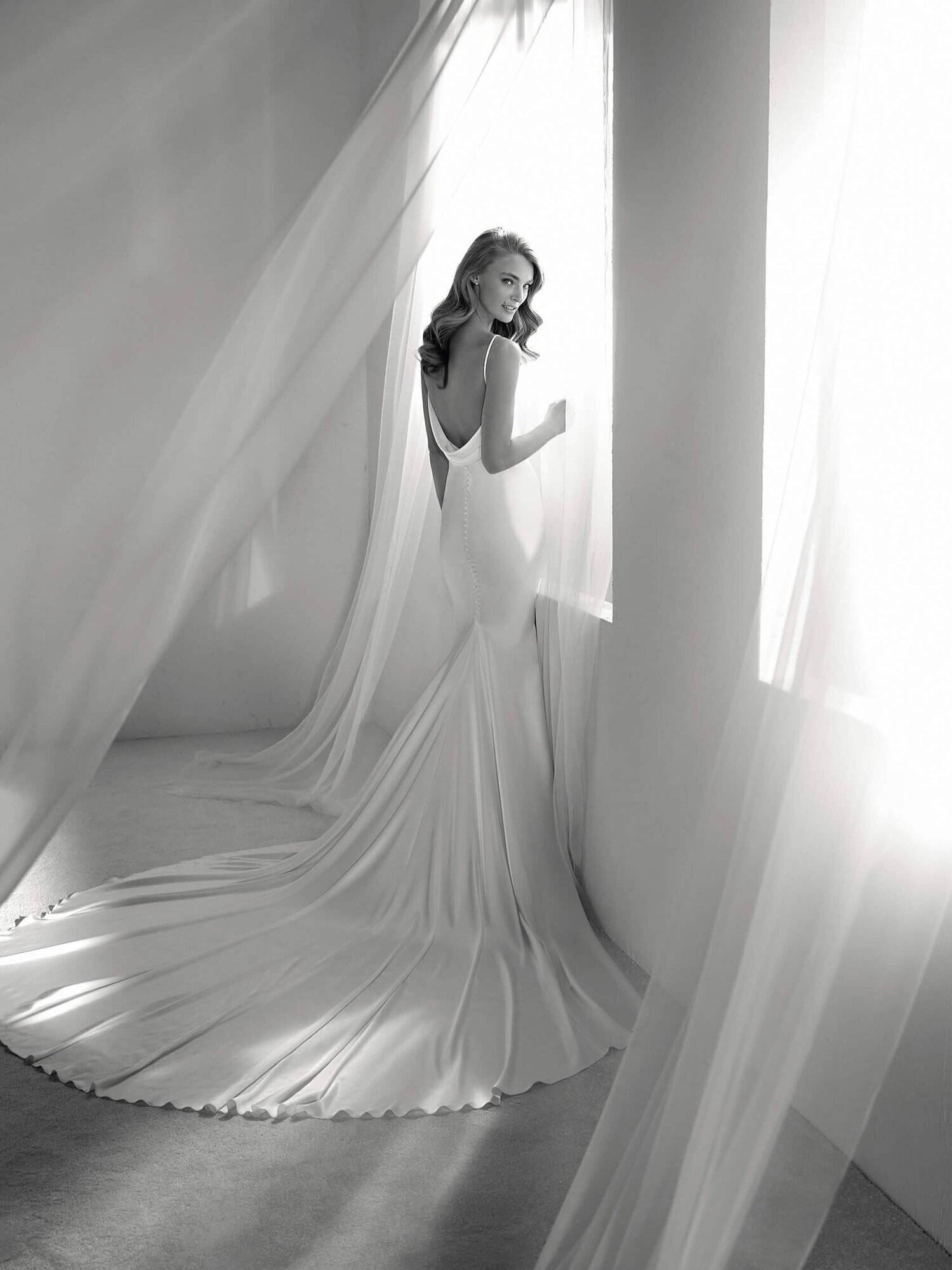 Pronovias {$2,600 - $3,500} 