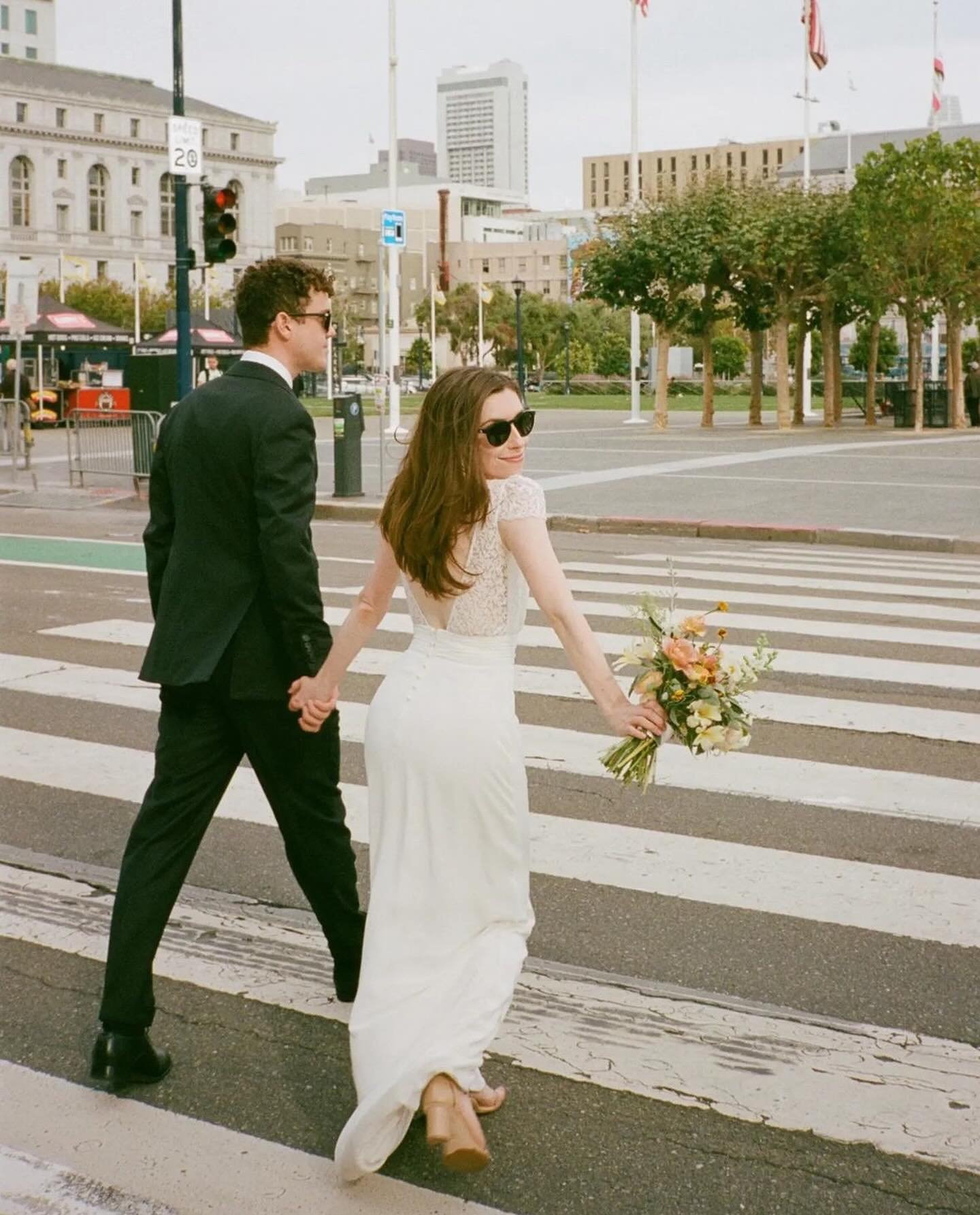#FINDYOURWILD // W + T ♡
⠀⠀⠀⠀⠀⠀⠀⠀⠀
Our #RealBride Wesley graced the halls of San Francisco&rsquo;s iconic #SFCityHall, looking stunning in the exquisite 𝑩𝒖𝒌𝒐𝒘𝒔𝒌𝒊 gown by @lauredesagazan as she exchanged vows with her love Tyler. Heartfelt con
