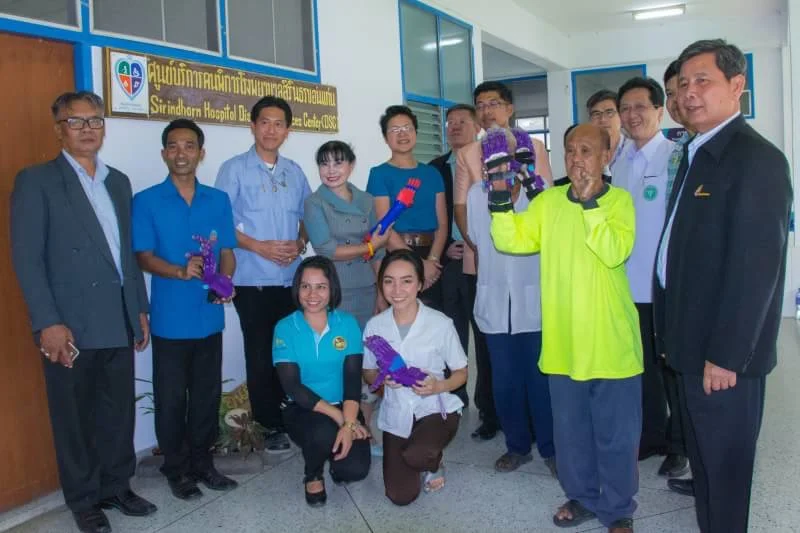 Staff and dignitaries at Sirindhorn Hospital with one of our first clients, Mr. Cumnunt