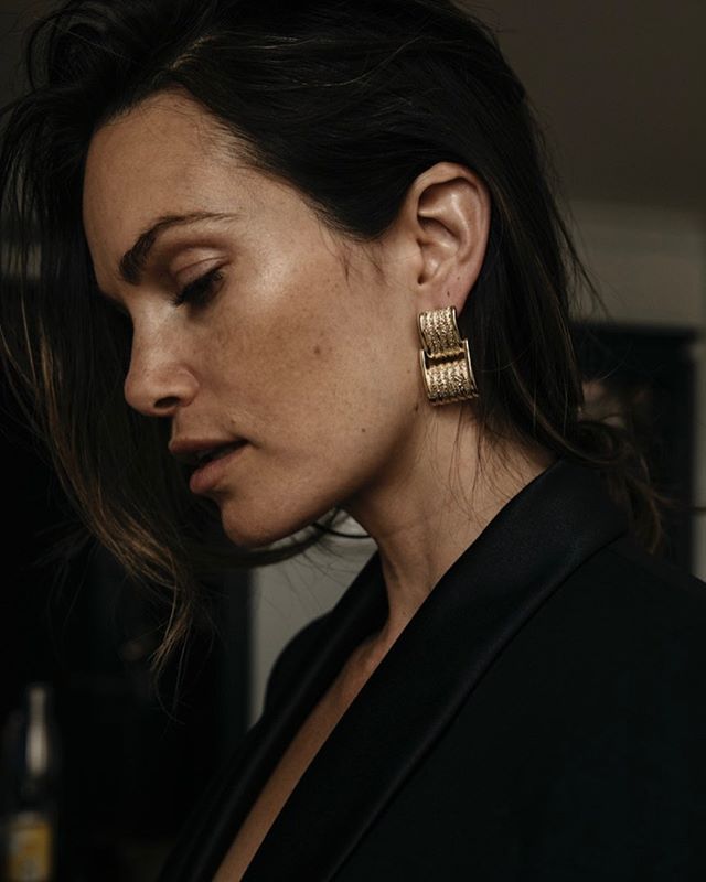 Black suits and our Vivienne earring, our version of holiday.