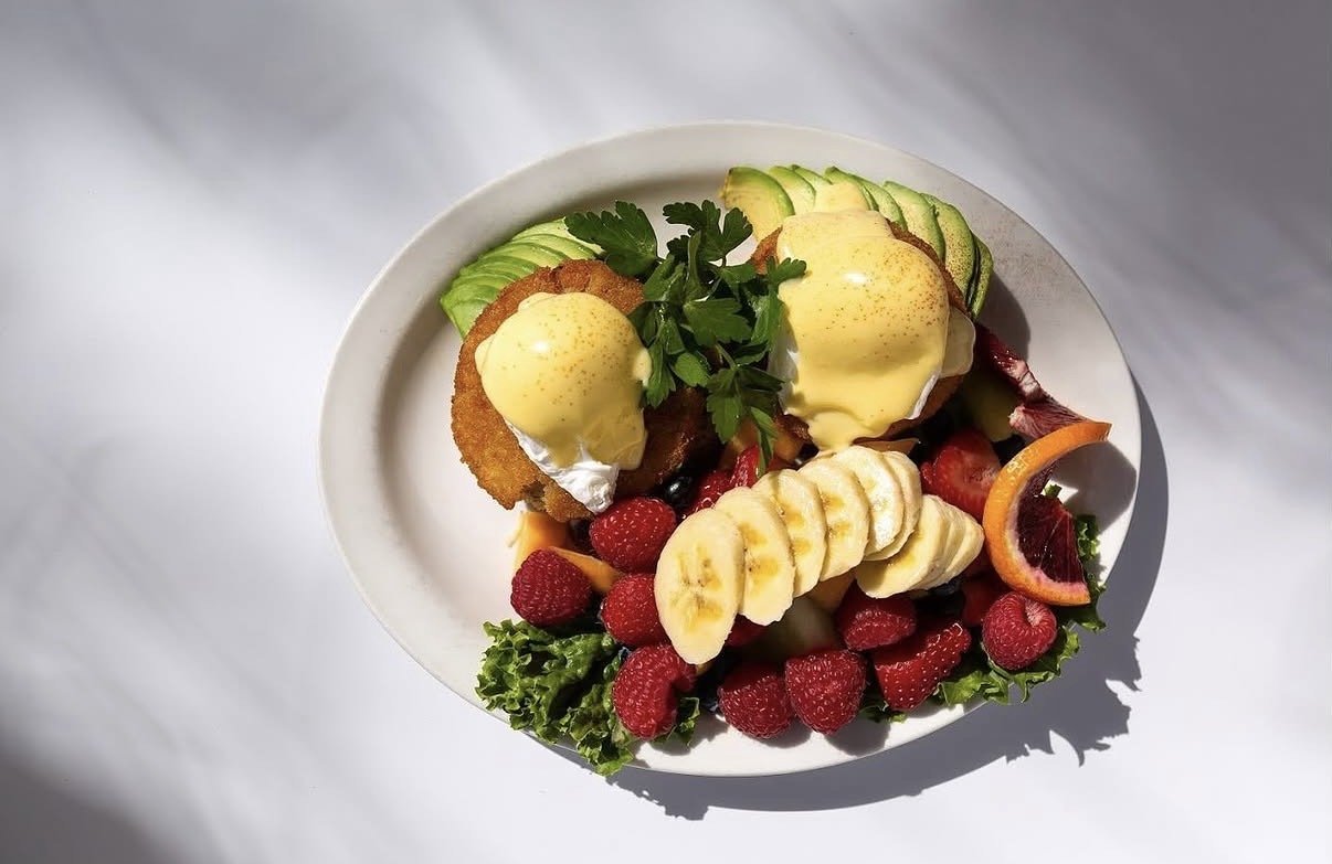 Eggs Benedict and fruit at The Breakfast Club in Seaside, California