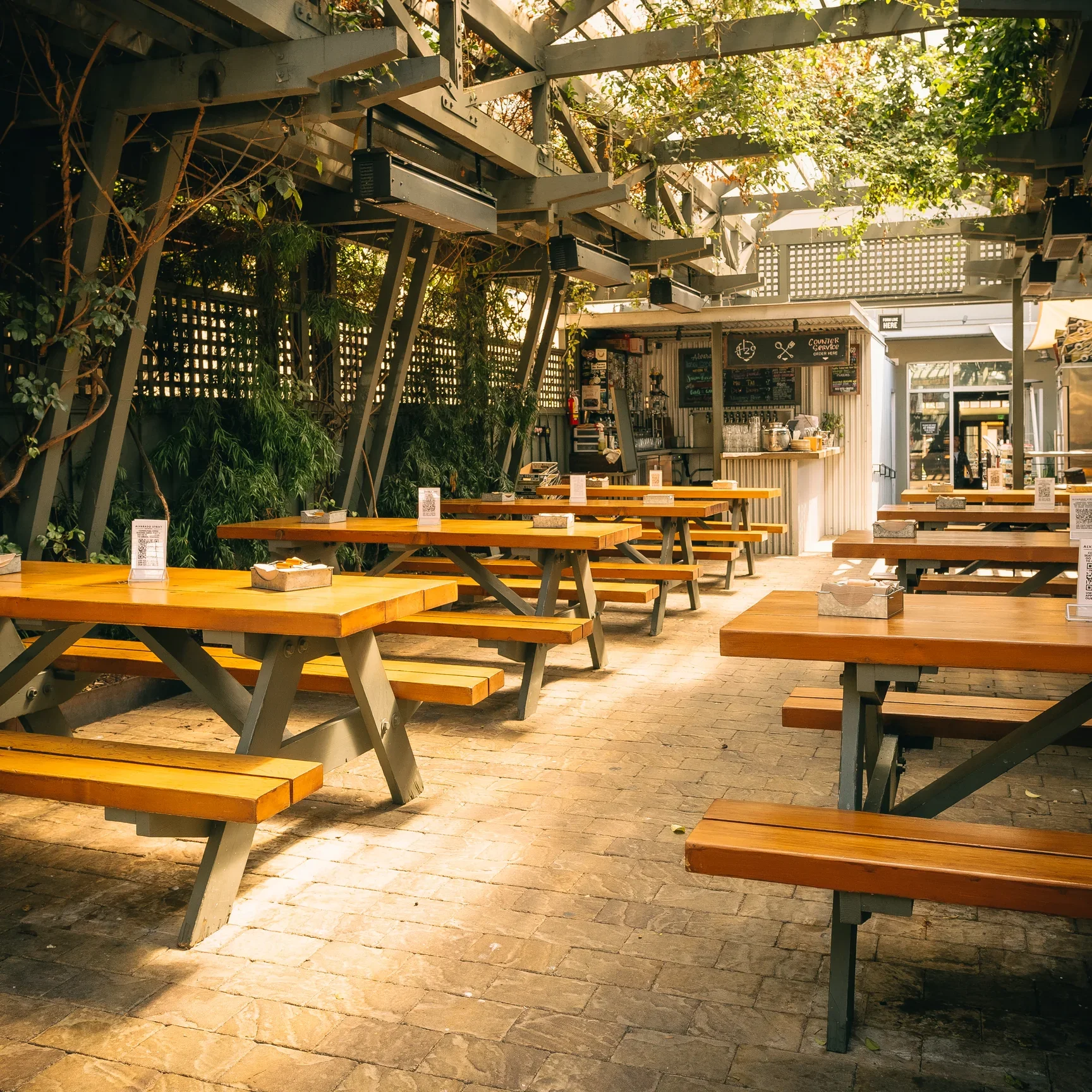 Outdoor patio dining at Alvarado Street Brewery in Monterey, California.