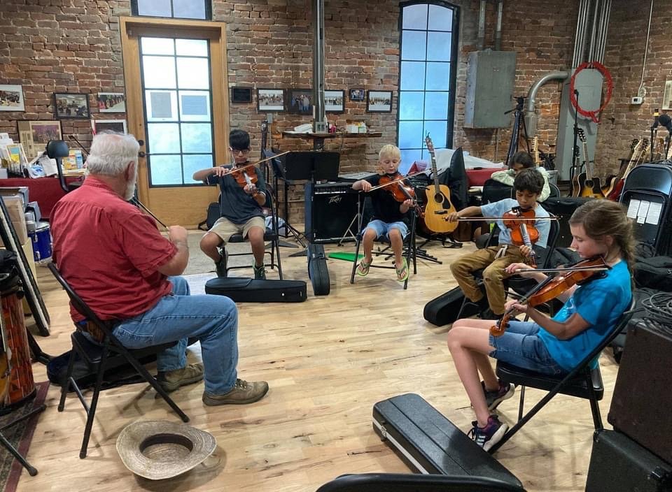   Welcome to    The Quest Center    We use music education to empower and positively impact the lives of children living in rural, lower-income communities, giving them essential skills to help them reach their potential.    Learn more   