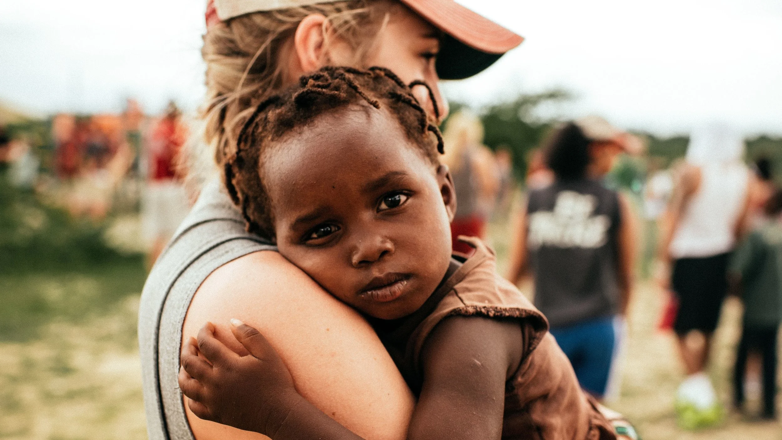 Christian Missionary Holding Child Religious Stock Photo.jpg