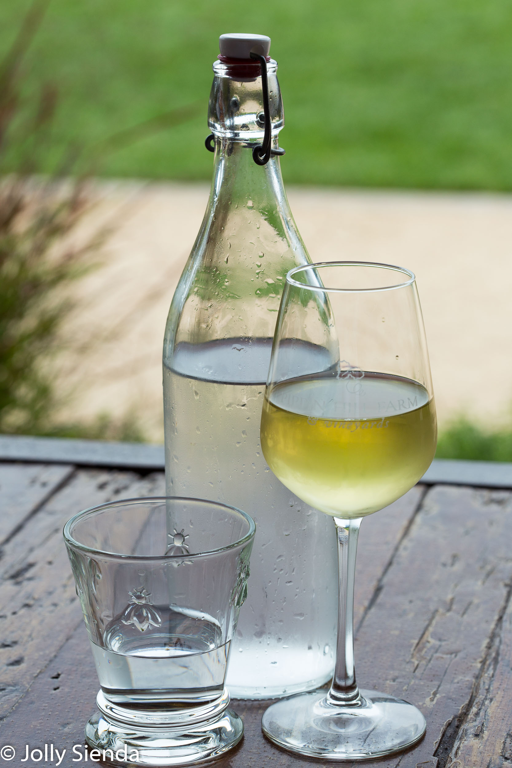 Chilled White Wine, bee pressed goblet, and water jug 