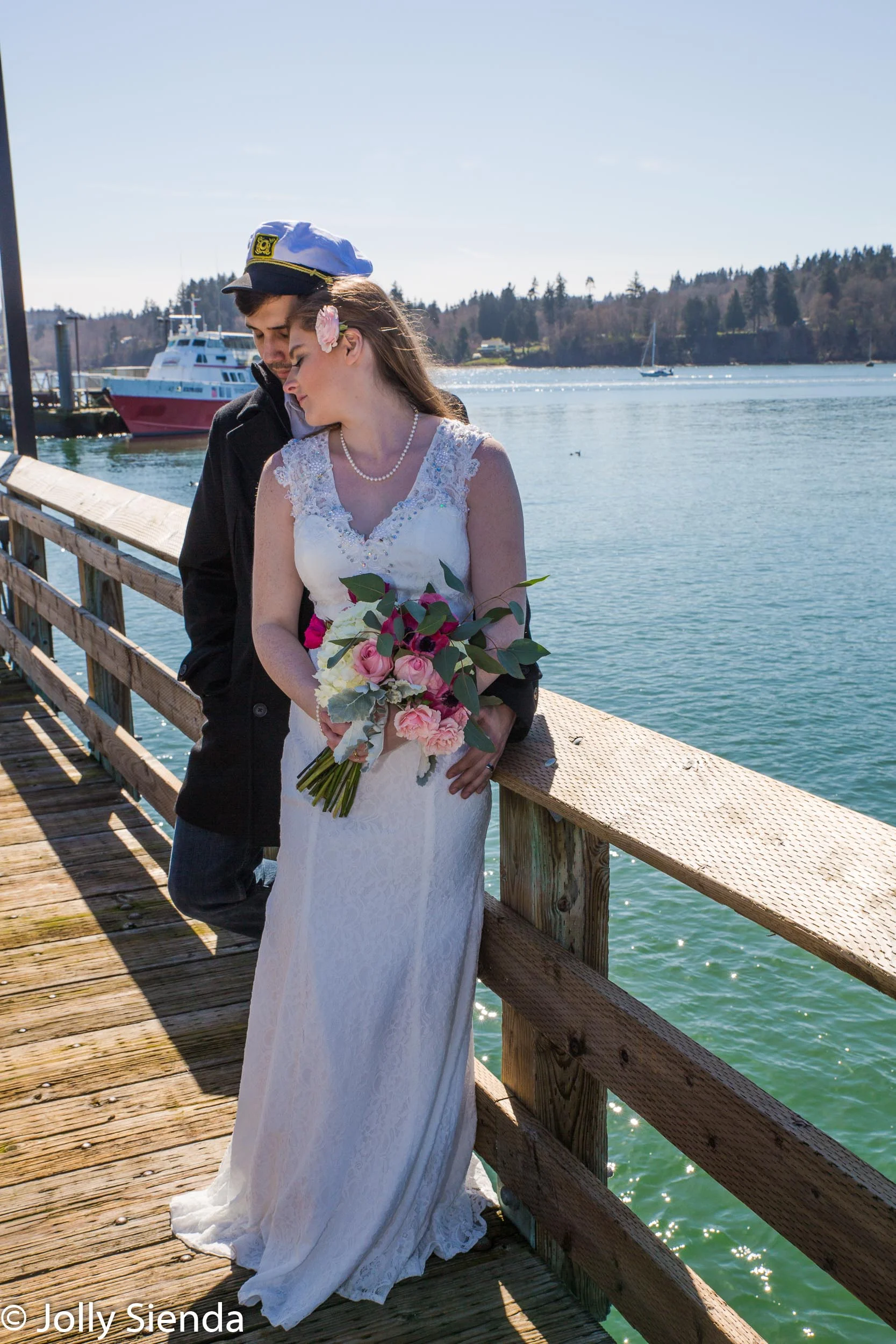 Samantha and Jake Viveiros wedding photography portrait with bou