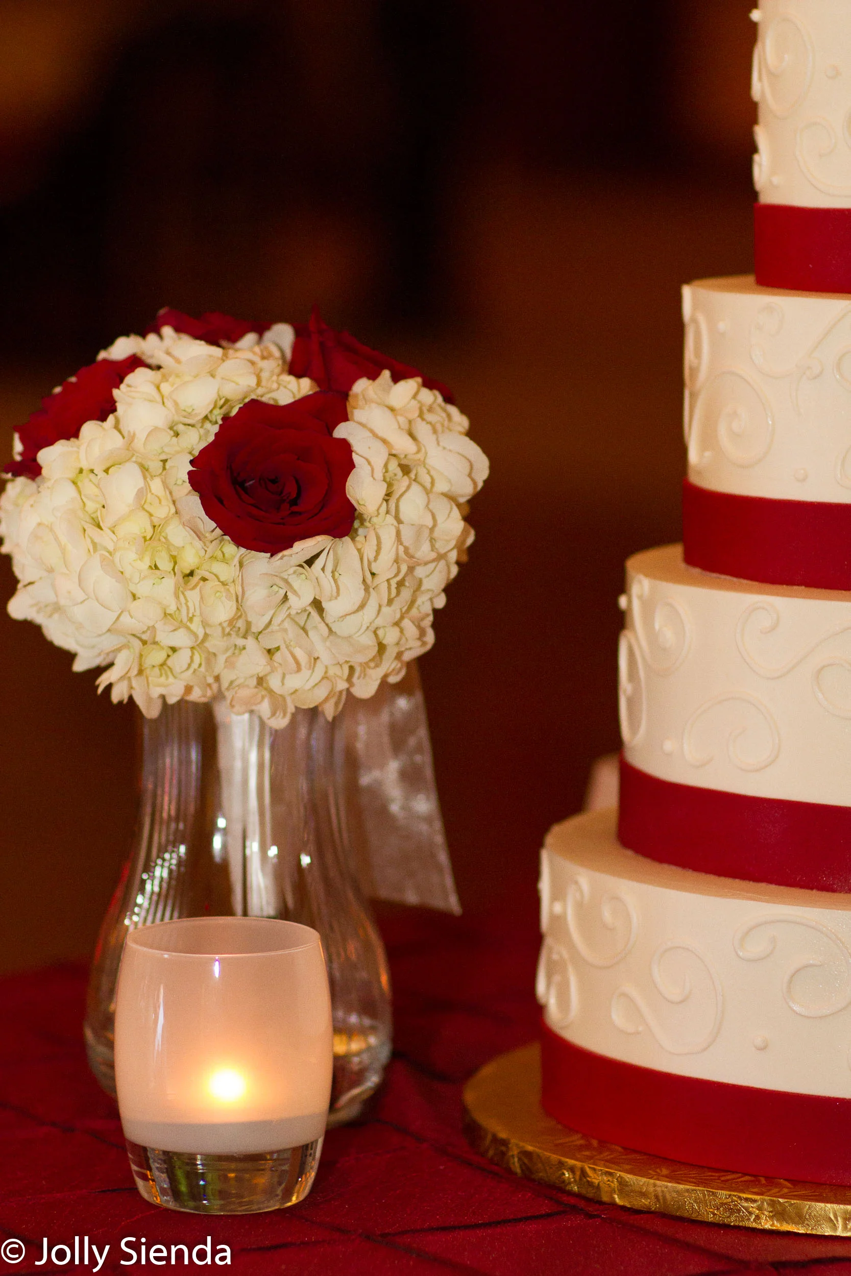 Red Roses and red and white wedding cake