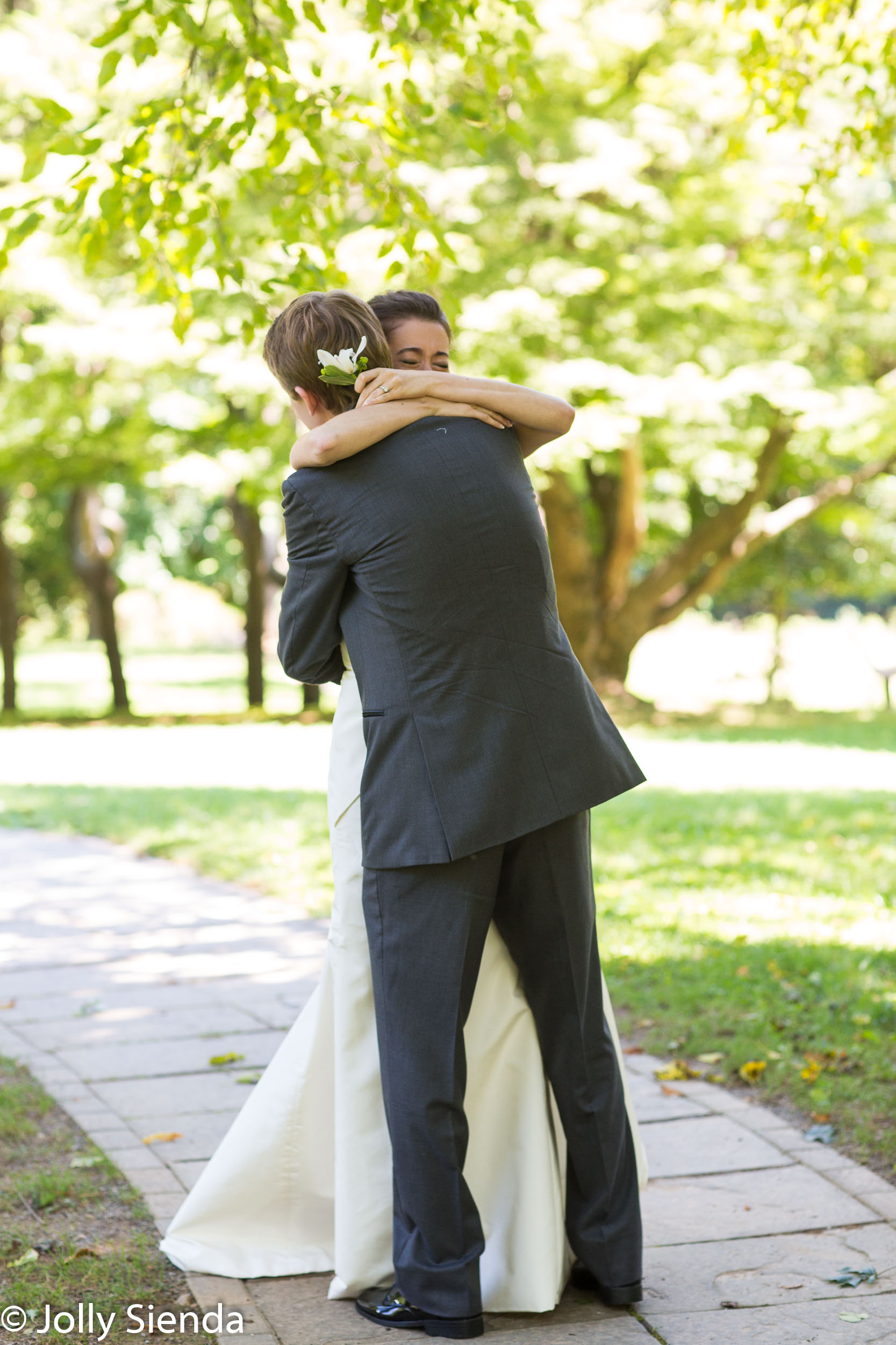 Bride and groom embrace, First Look