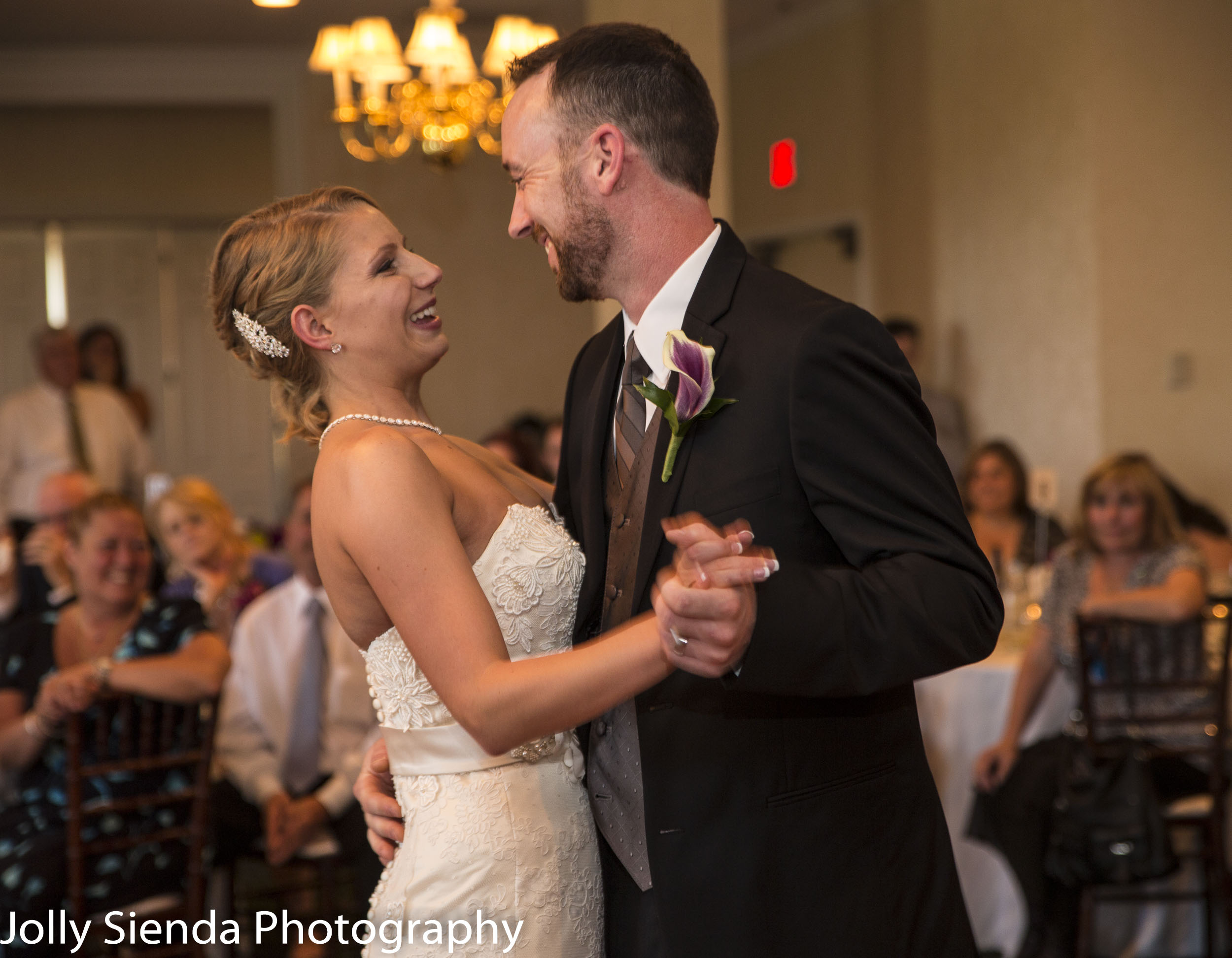 Portrait of a bride and groom dancing at their wedding reception