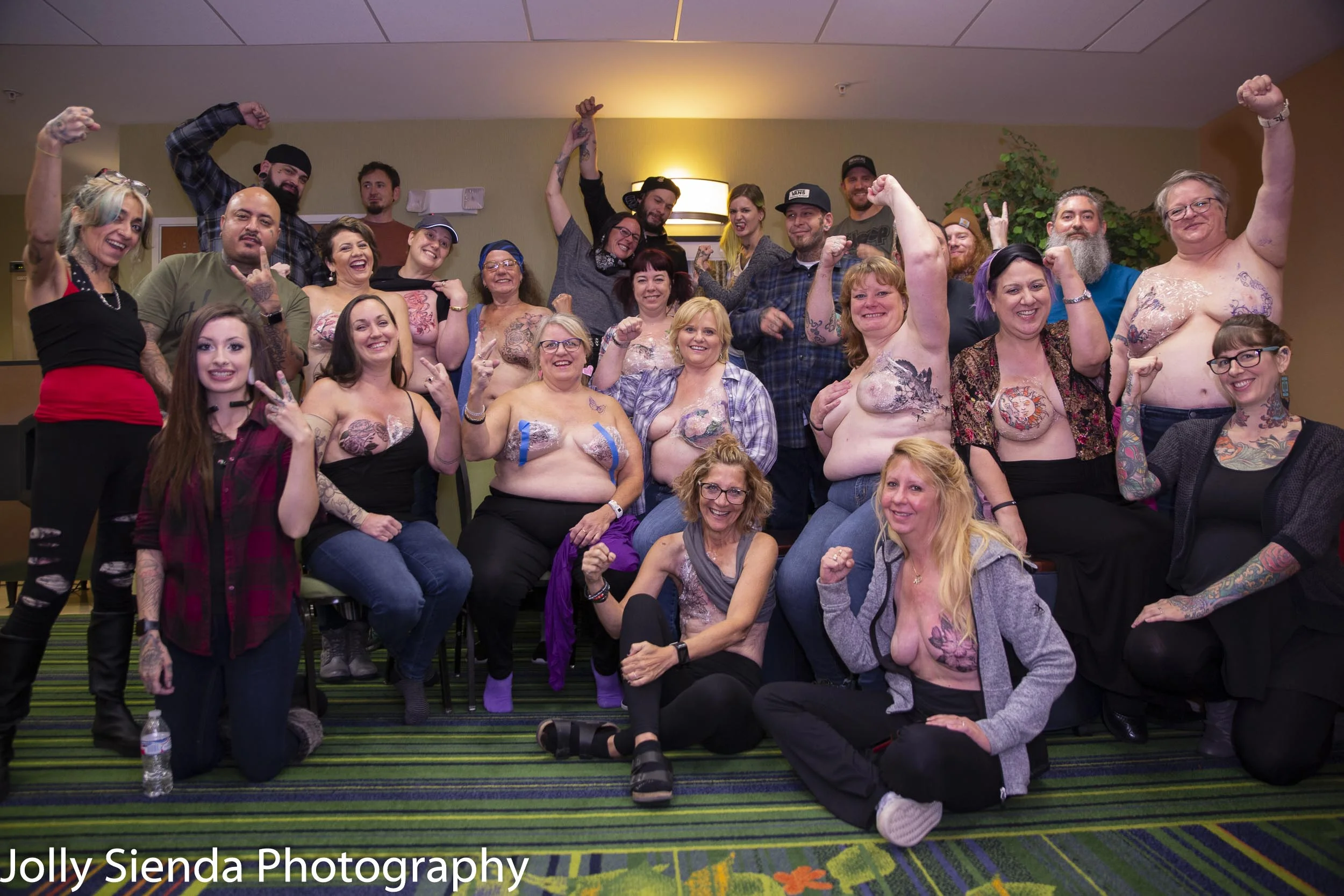 Breast Cancer Survivors get
Mastectomy Tatoos
