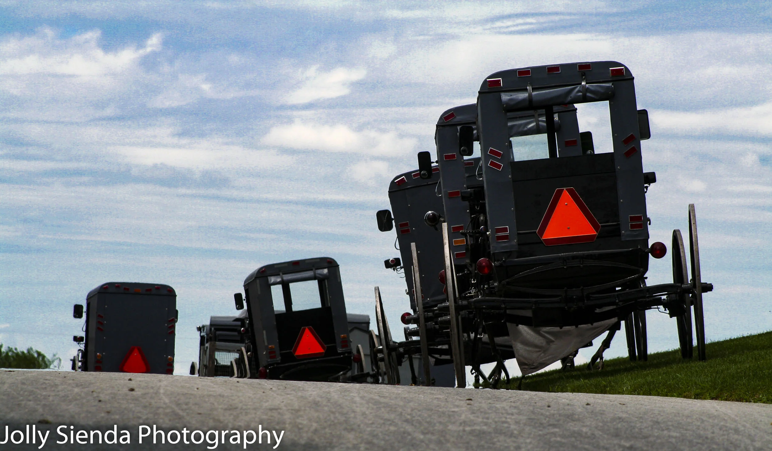 Parked Amish grey buggies