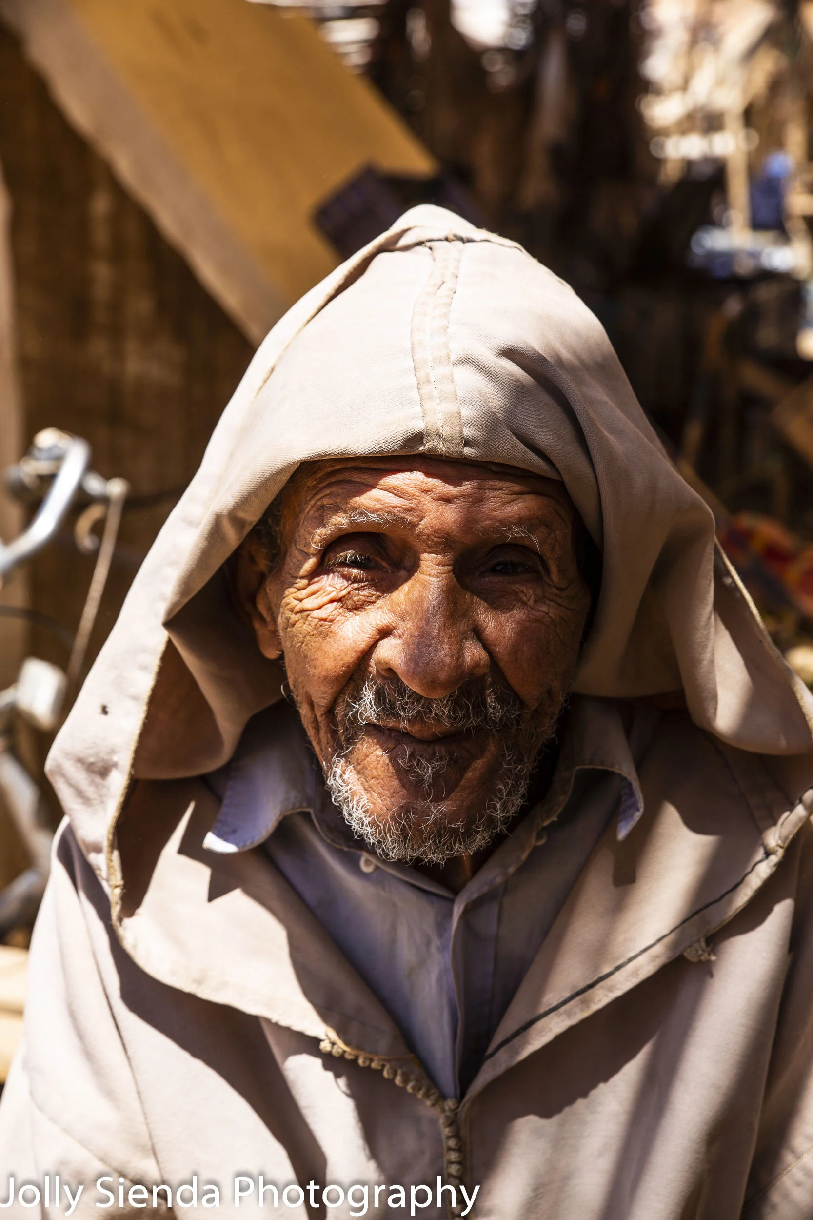 Portrait of an elder man wearing a jabala