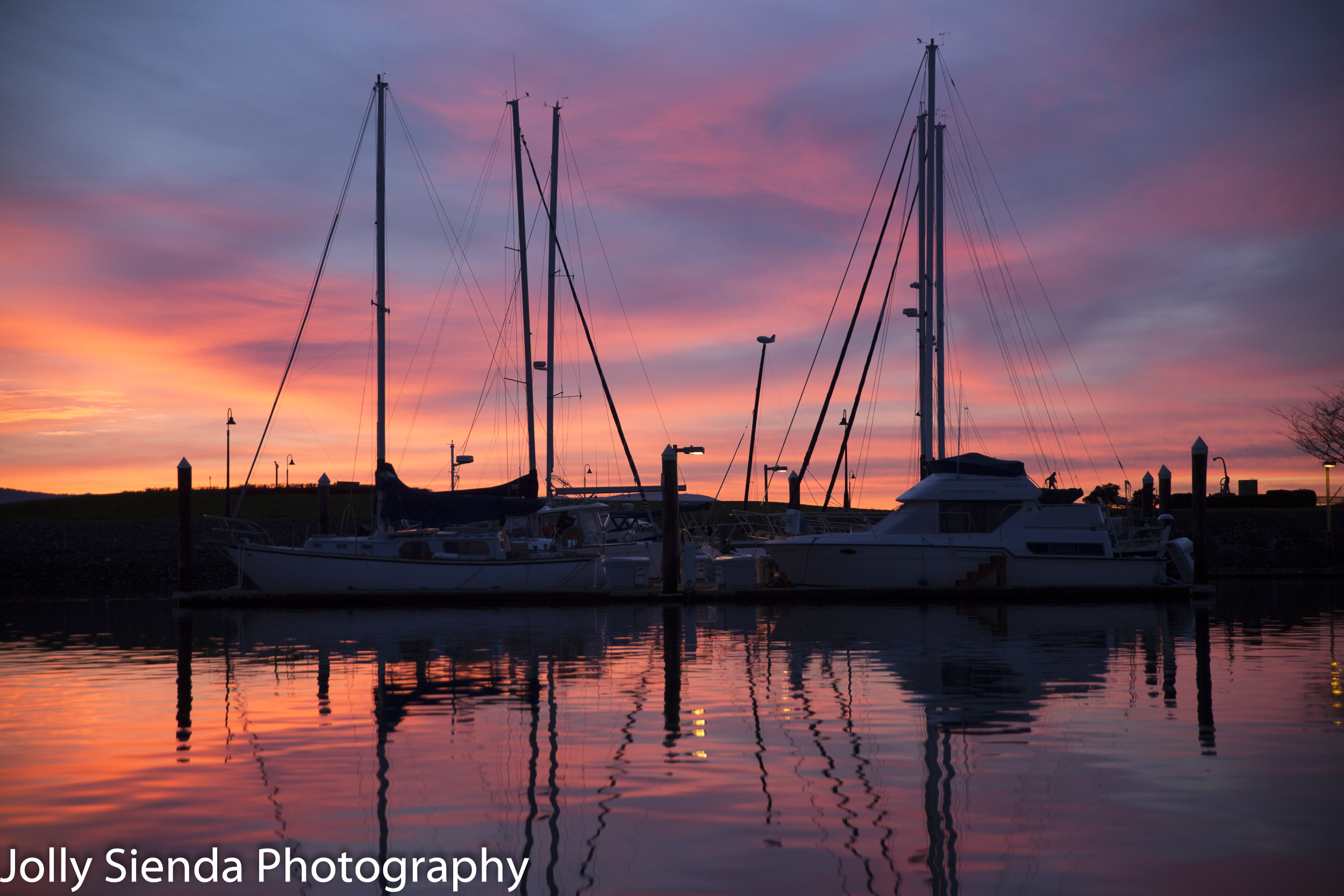 Pink sunset on boat marina