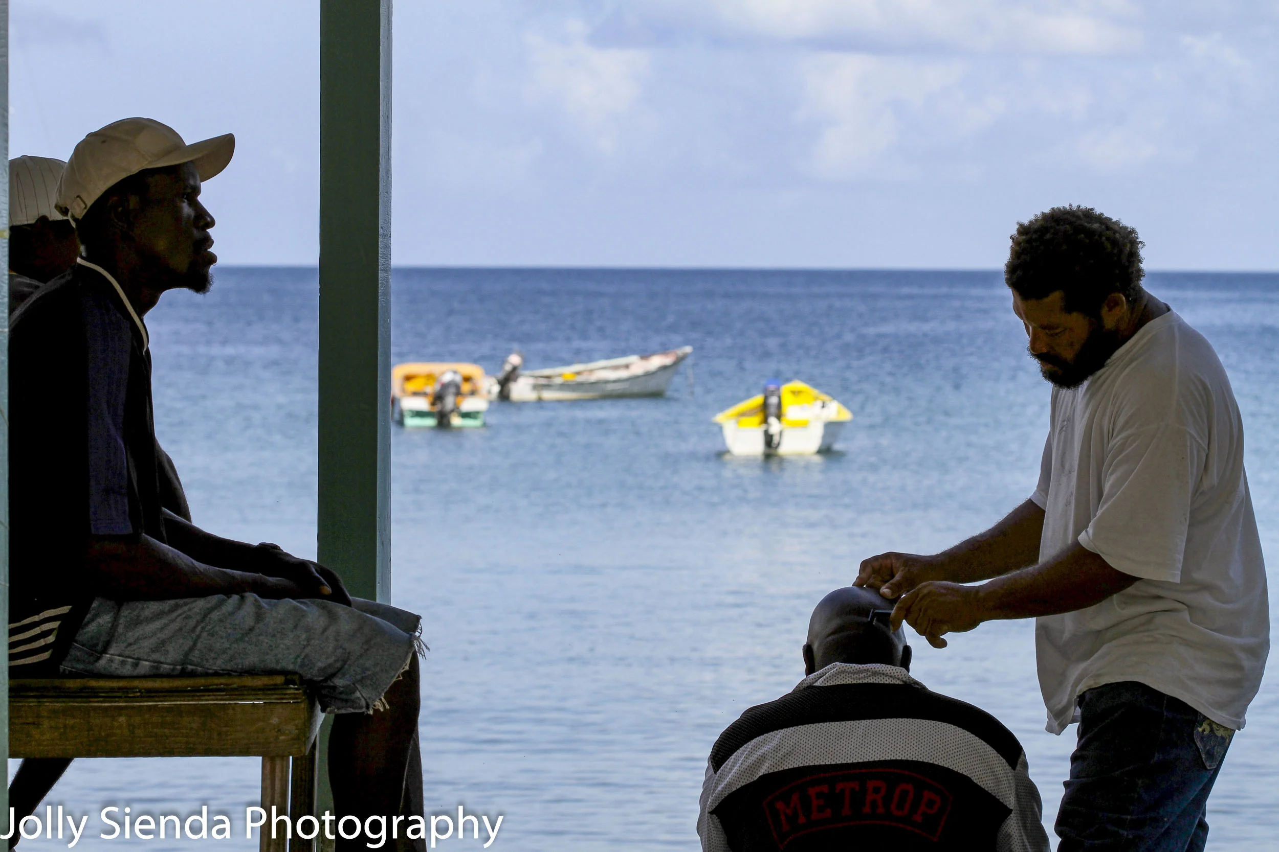 Getting a haircut on the beach