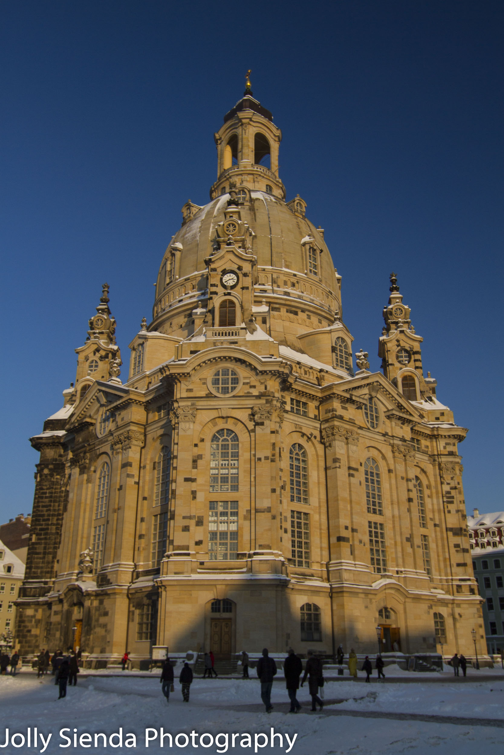 Church of our Lady, Frauenkirche, and people in the snow