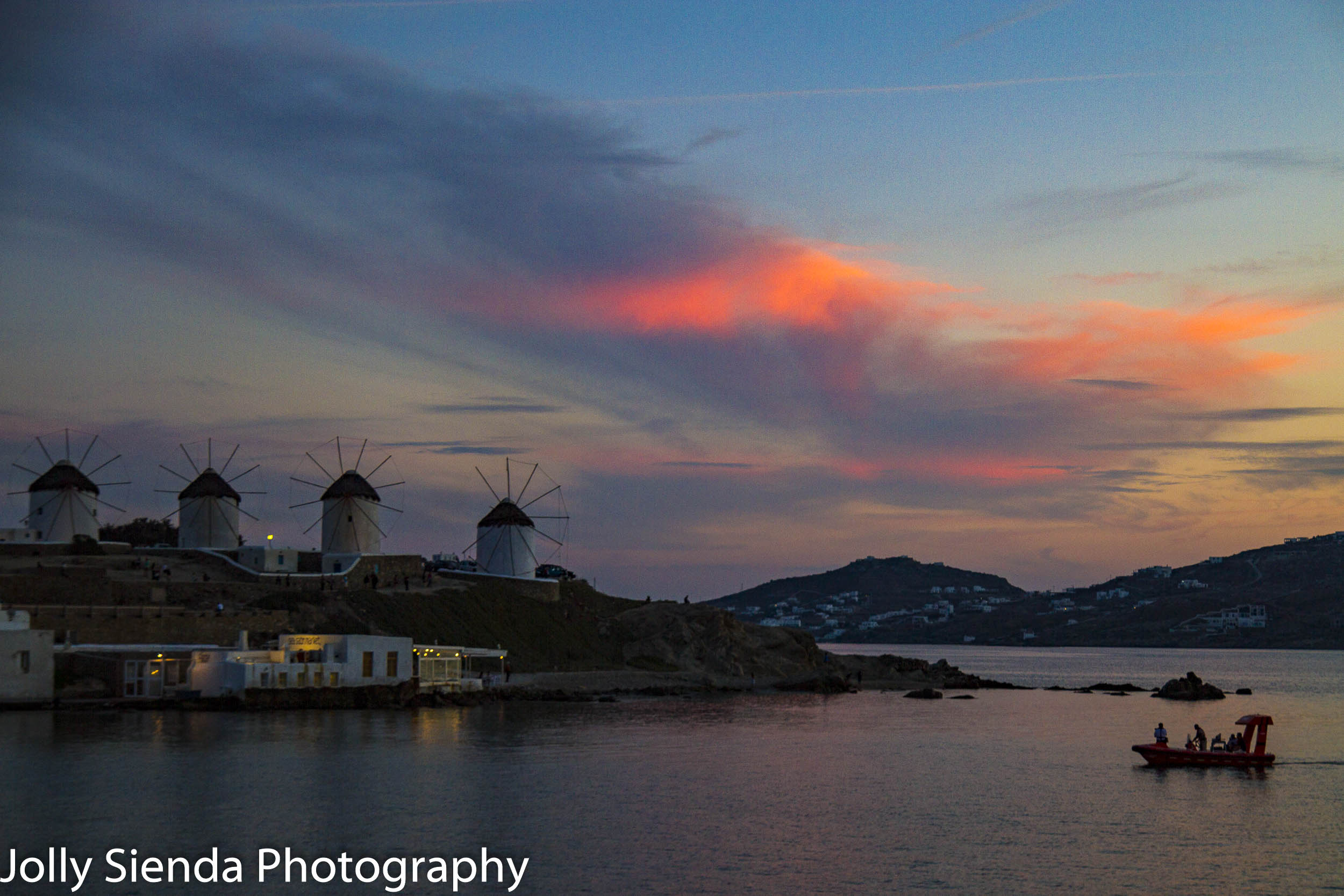 Greek windmills at Mykonos at sunset
