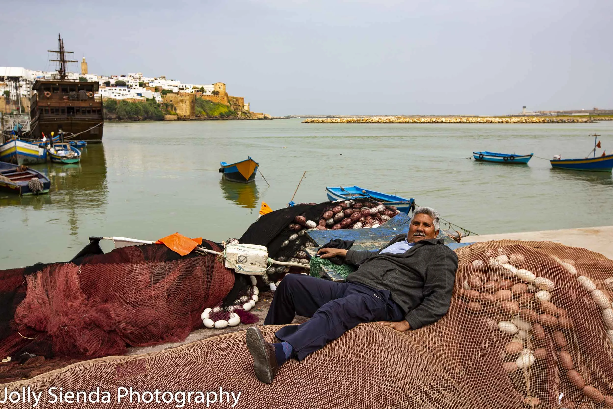 Fisherman wakes from a nap