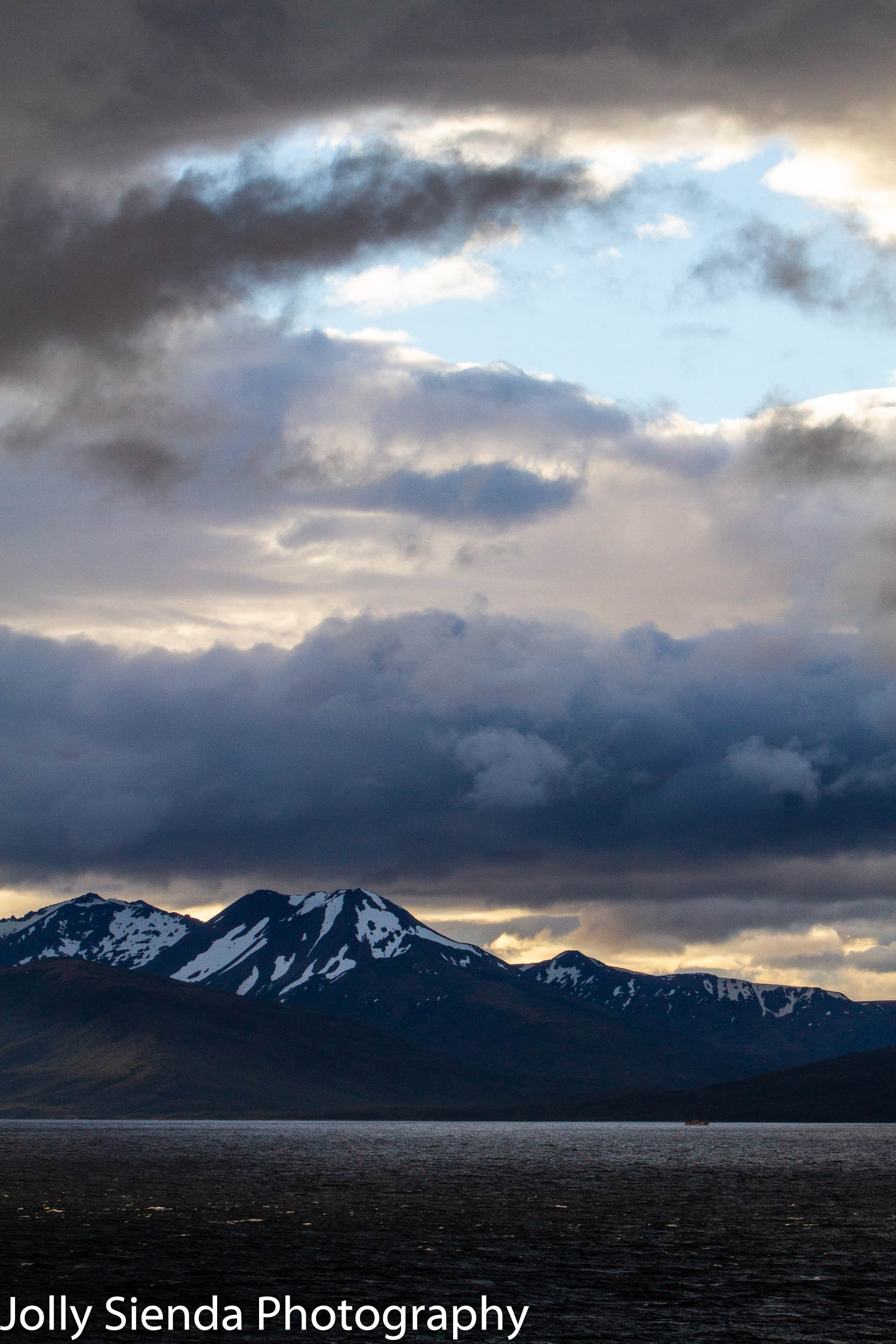 Pastel storm clouds and mountains on the Strait of Magellan