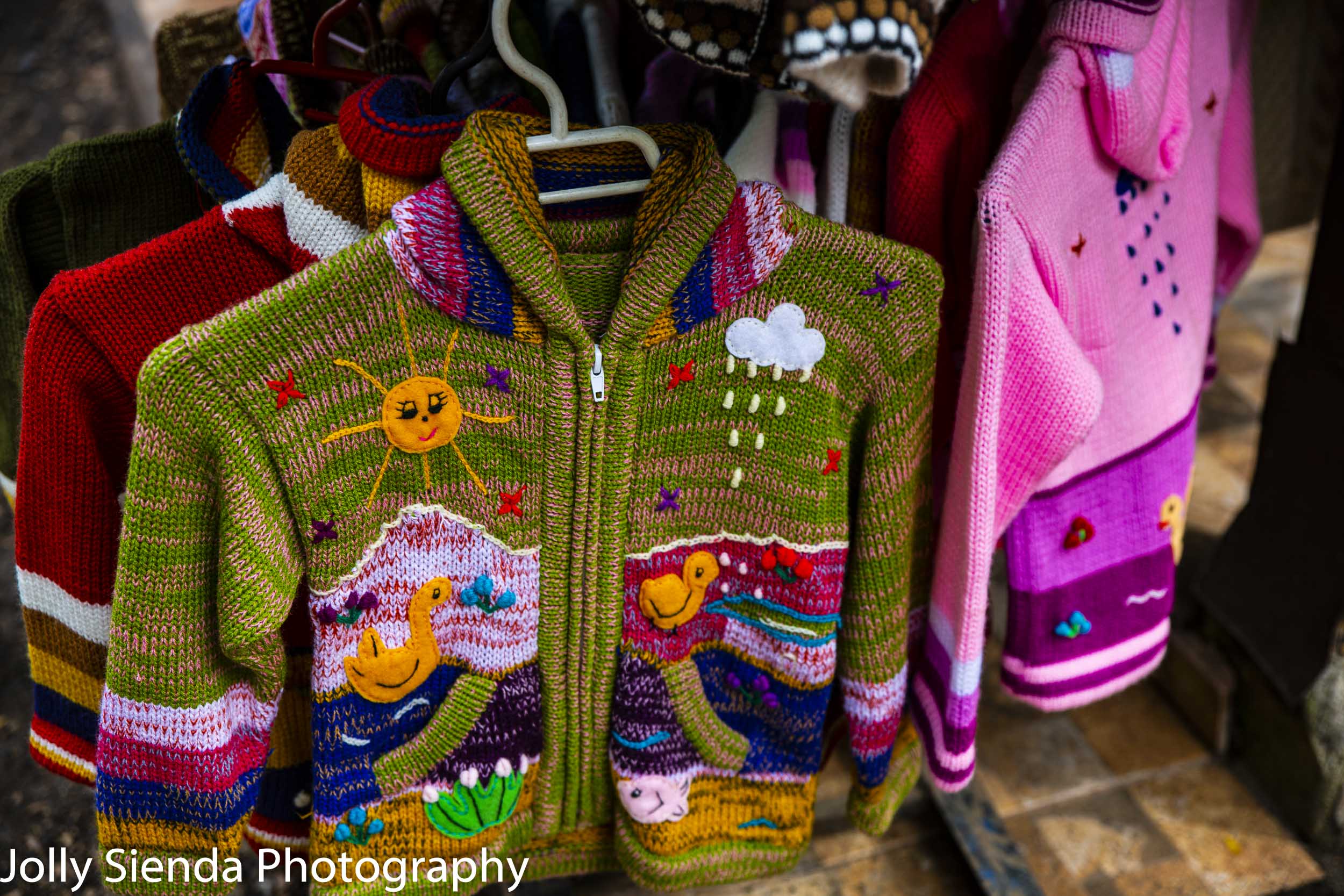 Colorful Chilean childrens woven sweaters 