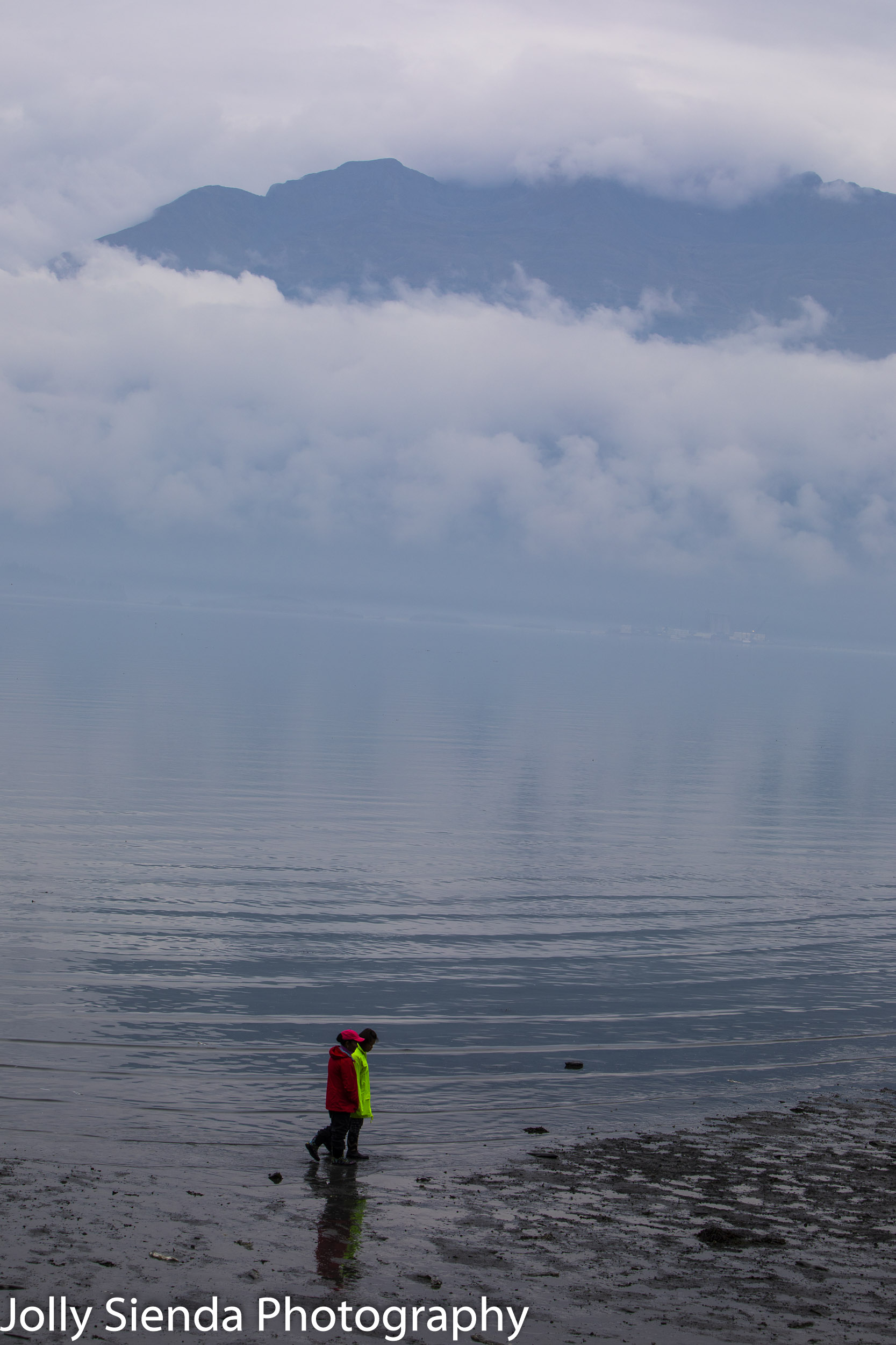 People walking in the Prince William Sound at low tide