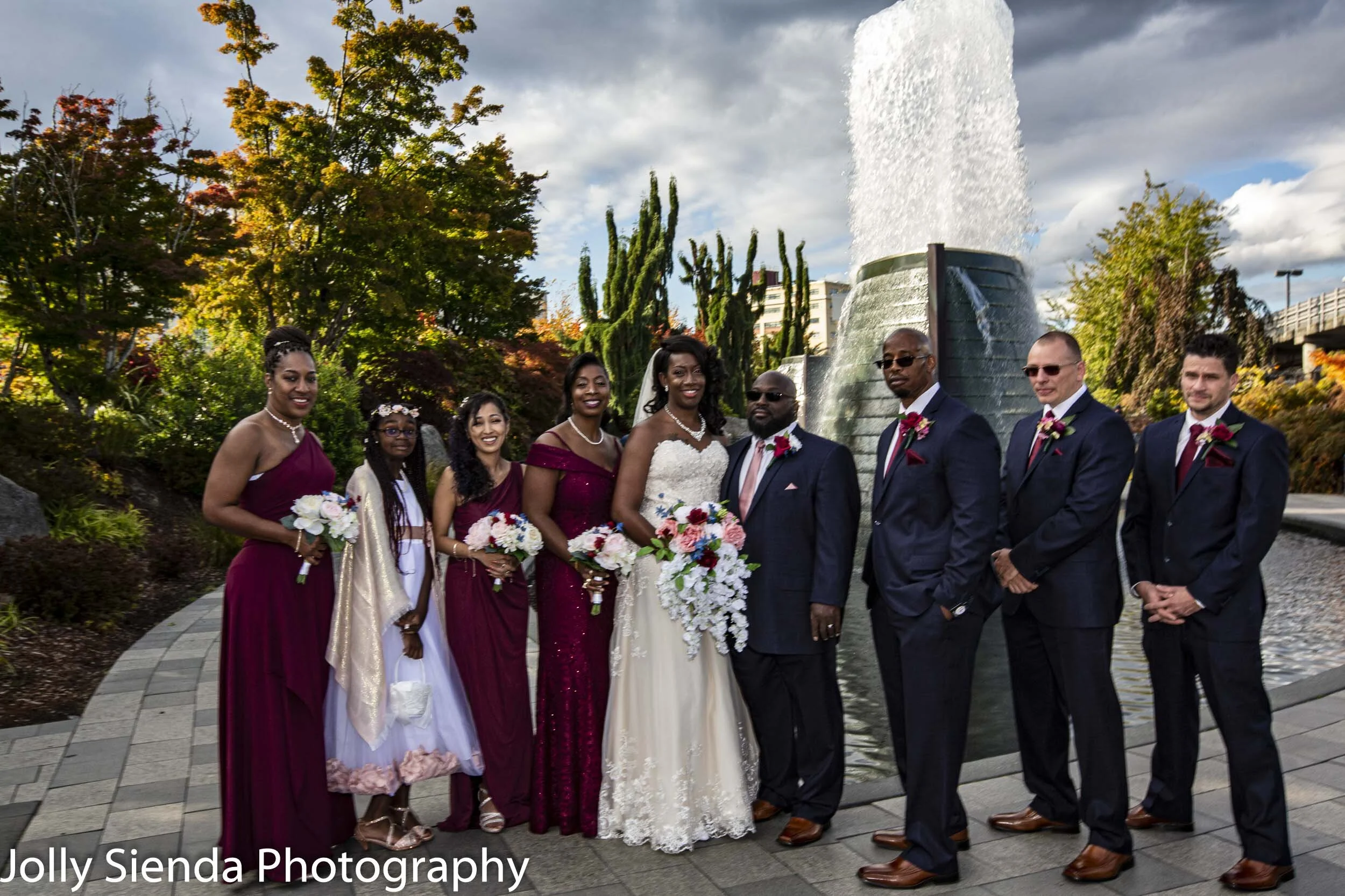 The bride and groom with their wedding party at Harborside Fountain Park, Bremerton, WA.
