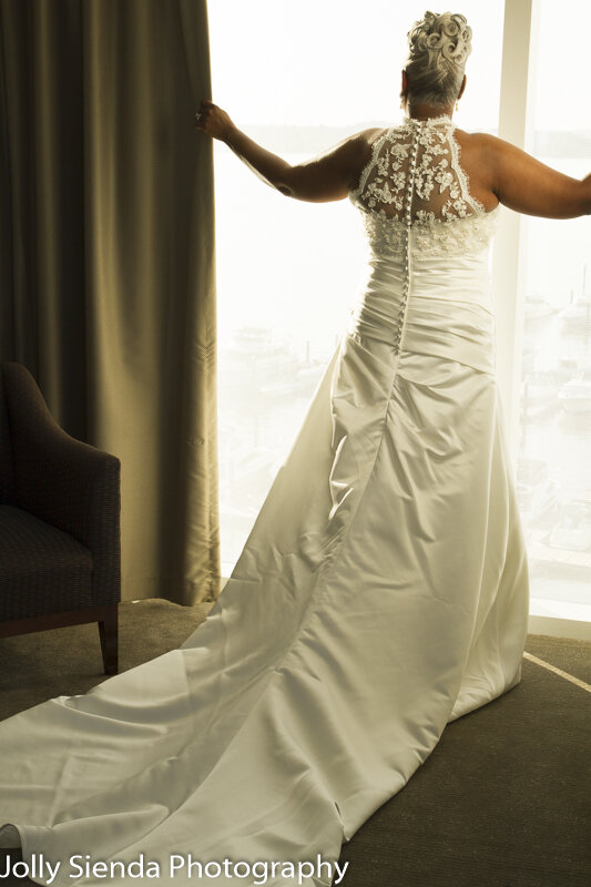 Mature bride and the lovely back of her wedding dress