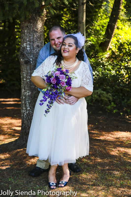 Sweet outdoor wedding photography with the bridal couple