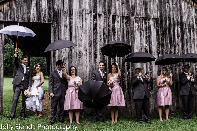 Wedding, Umbrellas, a Barn, and the Wedding Party